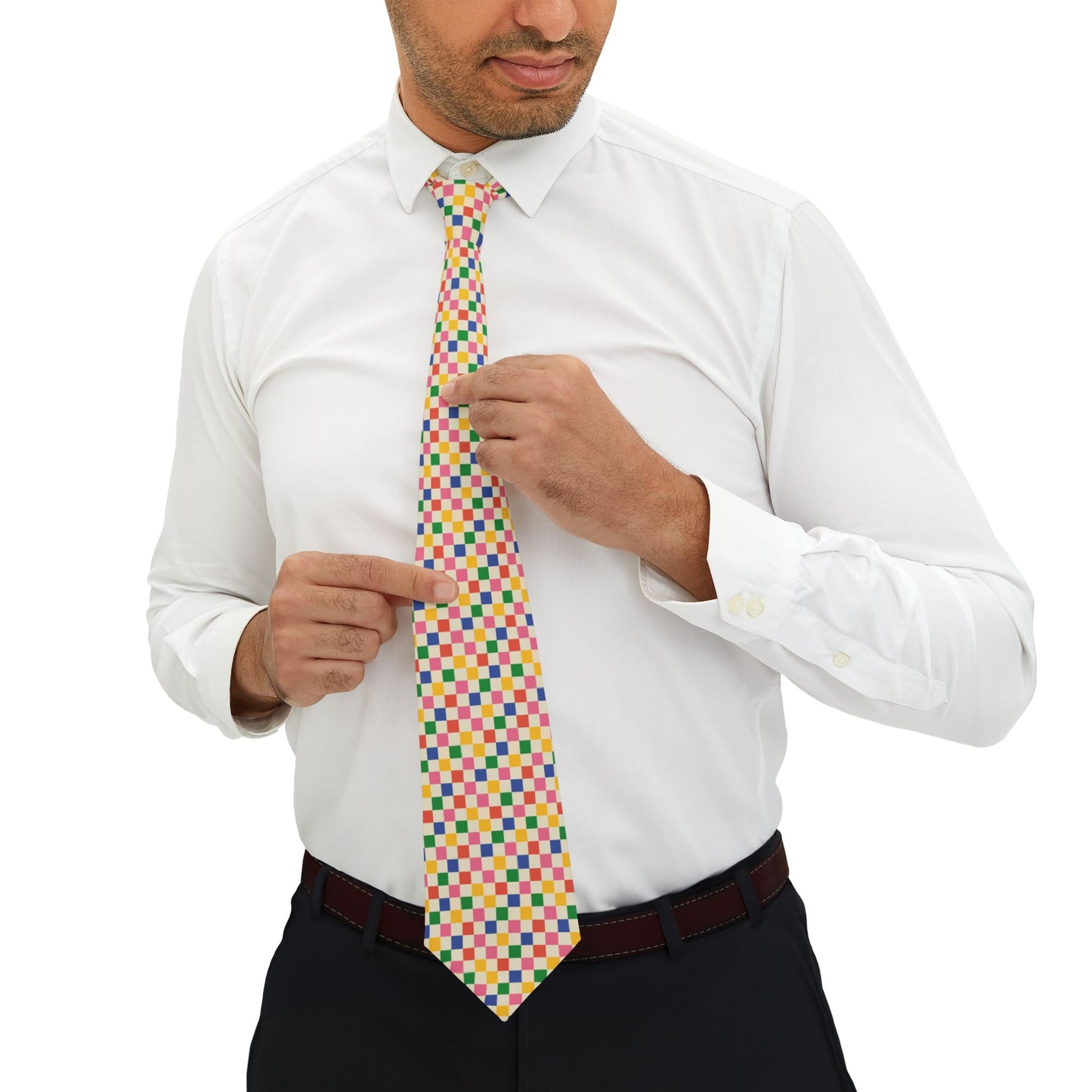 man adjusting colorful pixel pattern gaming necktie on white shirt
