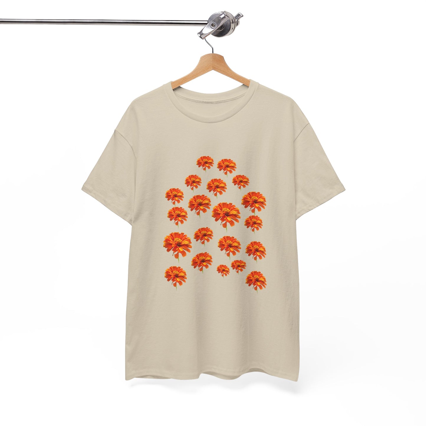 Beige Zinnia T-Shirt with orange flower design displayed on hanger front view