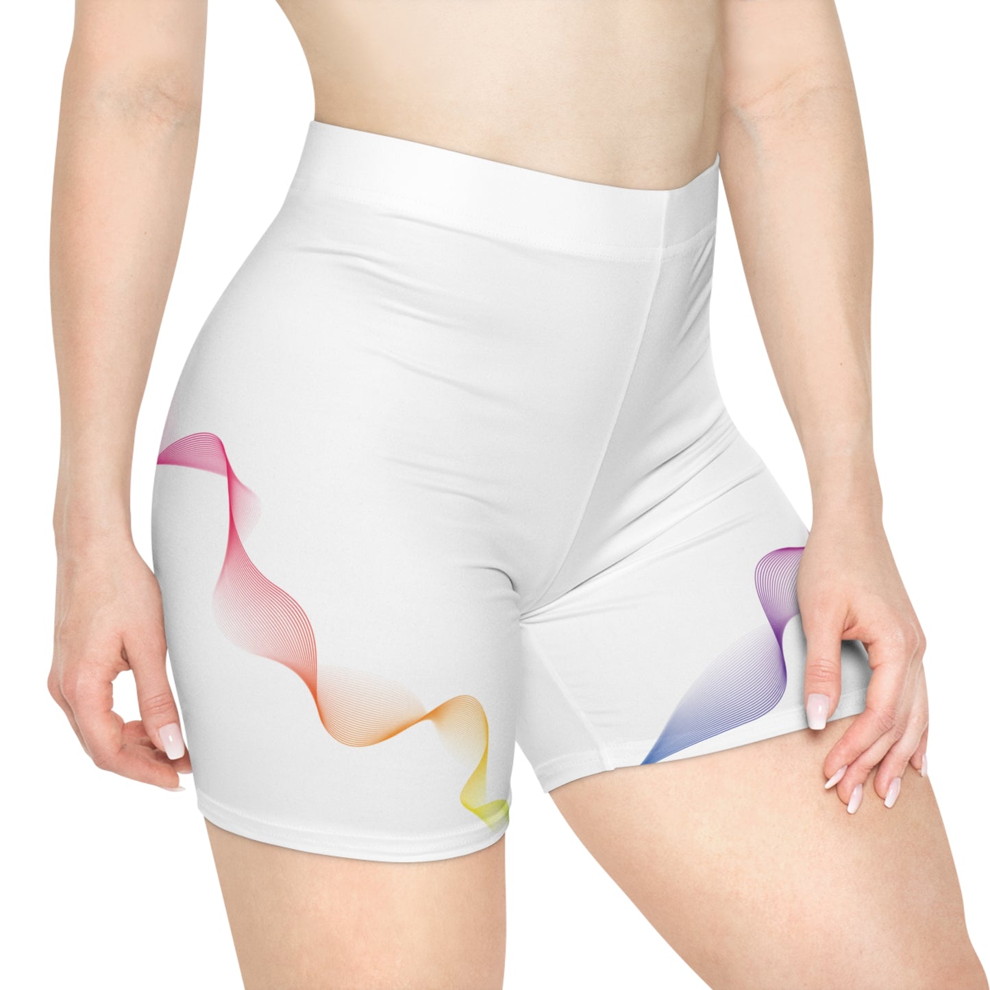 Woman wearing white 417 Hz yoga shorts with colorful wave artwork, front lifestyle view