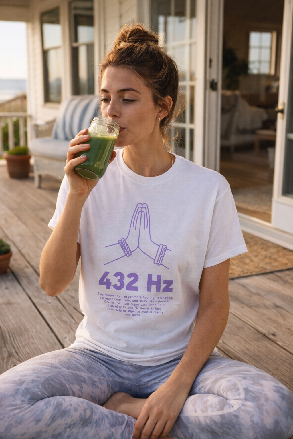 woman wearing white 432 hz frequency t shirt casual meditation outfit