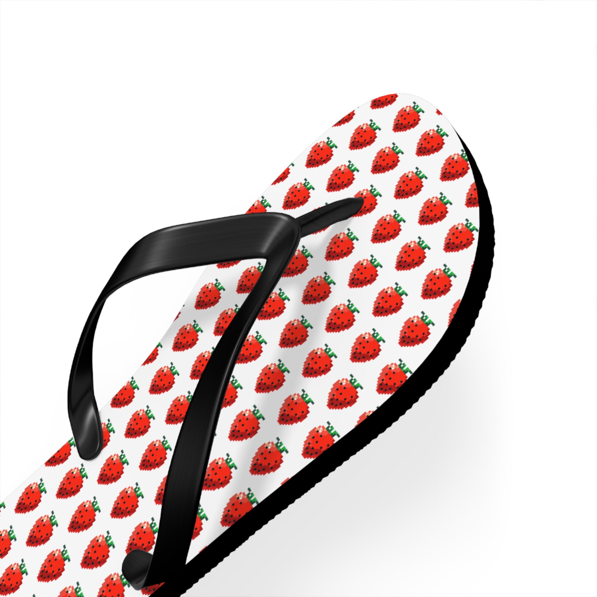 Close angle of pixel strawberry summer flip flops lightweight sandal design