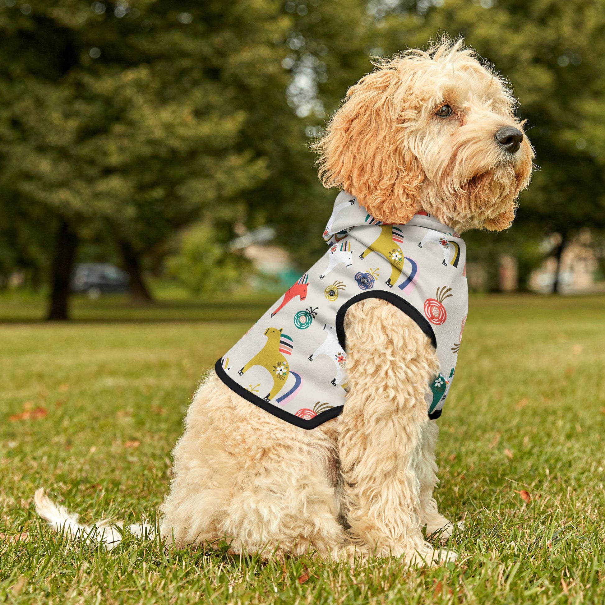 Dog outdoors wearing Horses Pet Hoodie with hood partially down