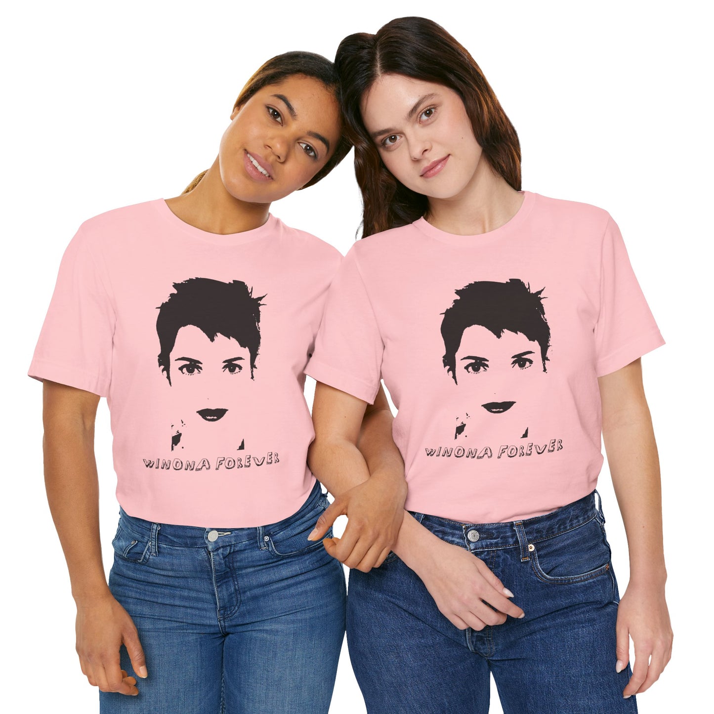 Two people in matching pink Winona Forever T-shirts posing together and smiling.