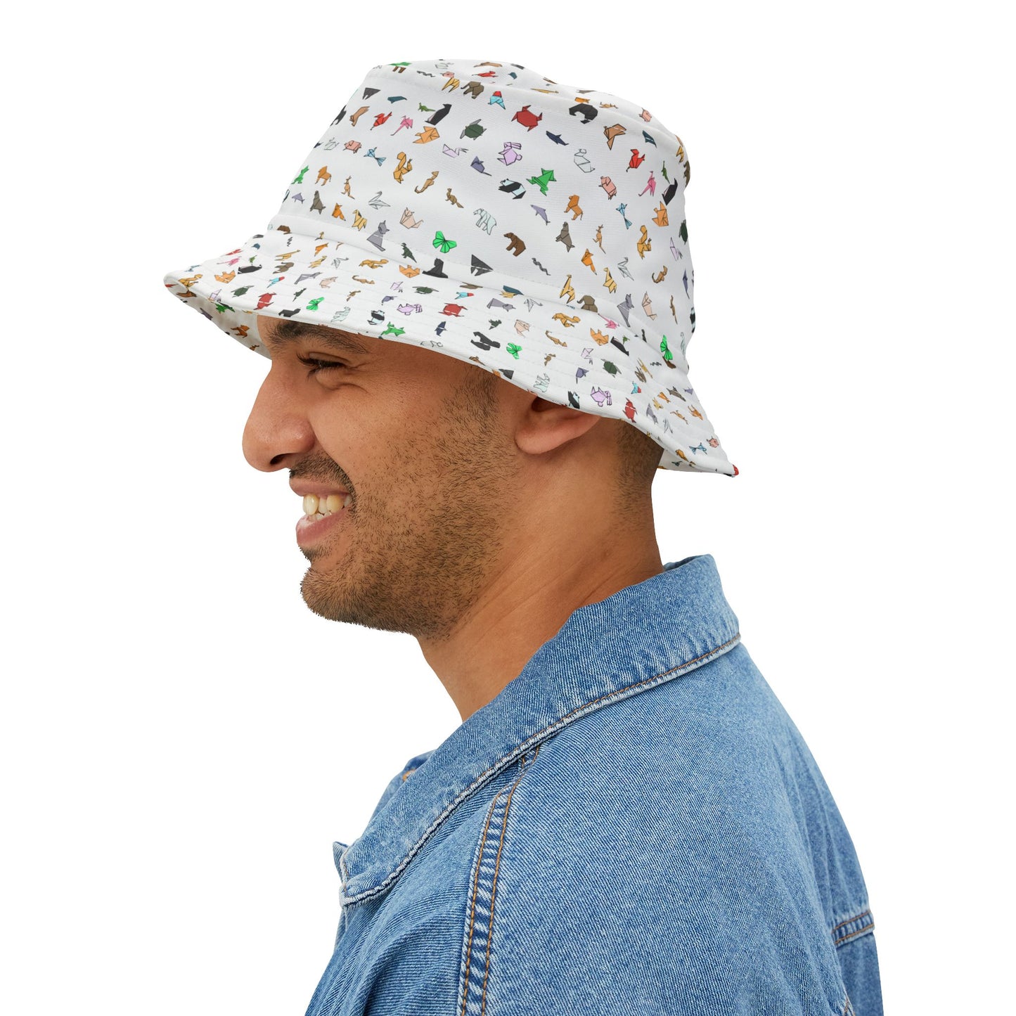 Man wearing a patterned bucket hat on a white background