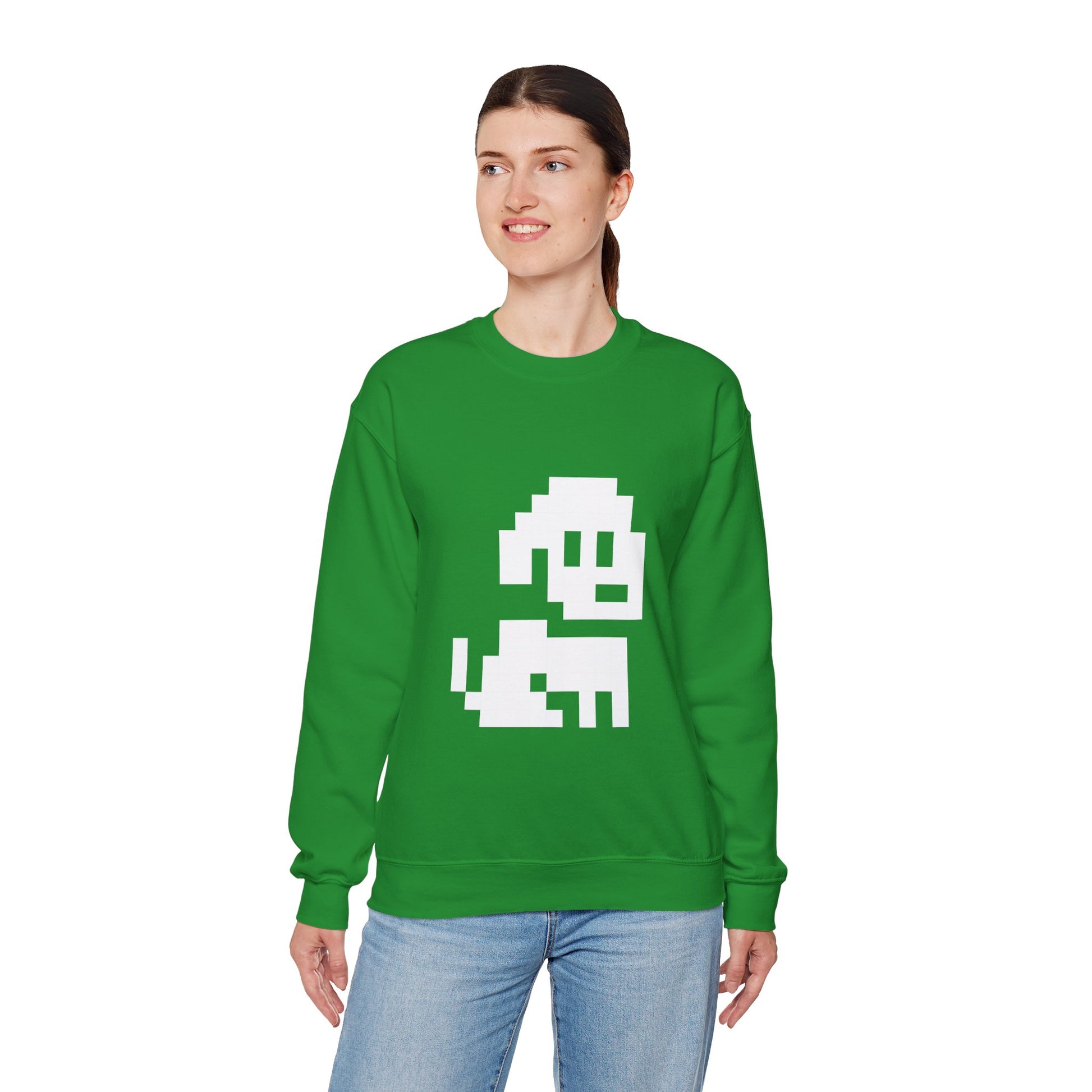 Person wearing a green sweatshirt with a white graphic design on a white background