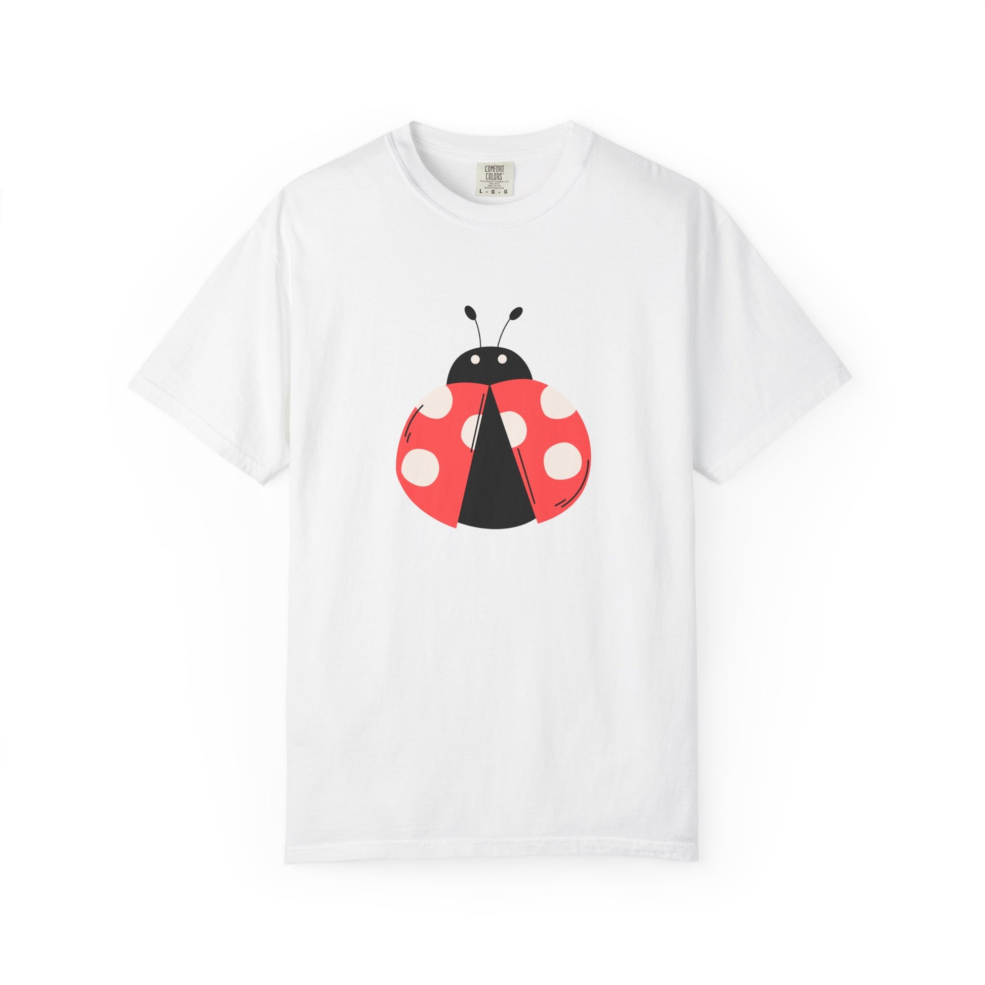 White t-shirt with a ladybug design on a white background