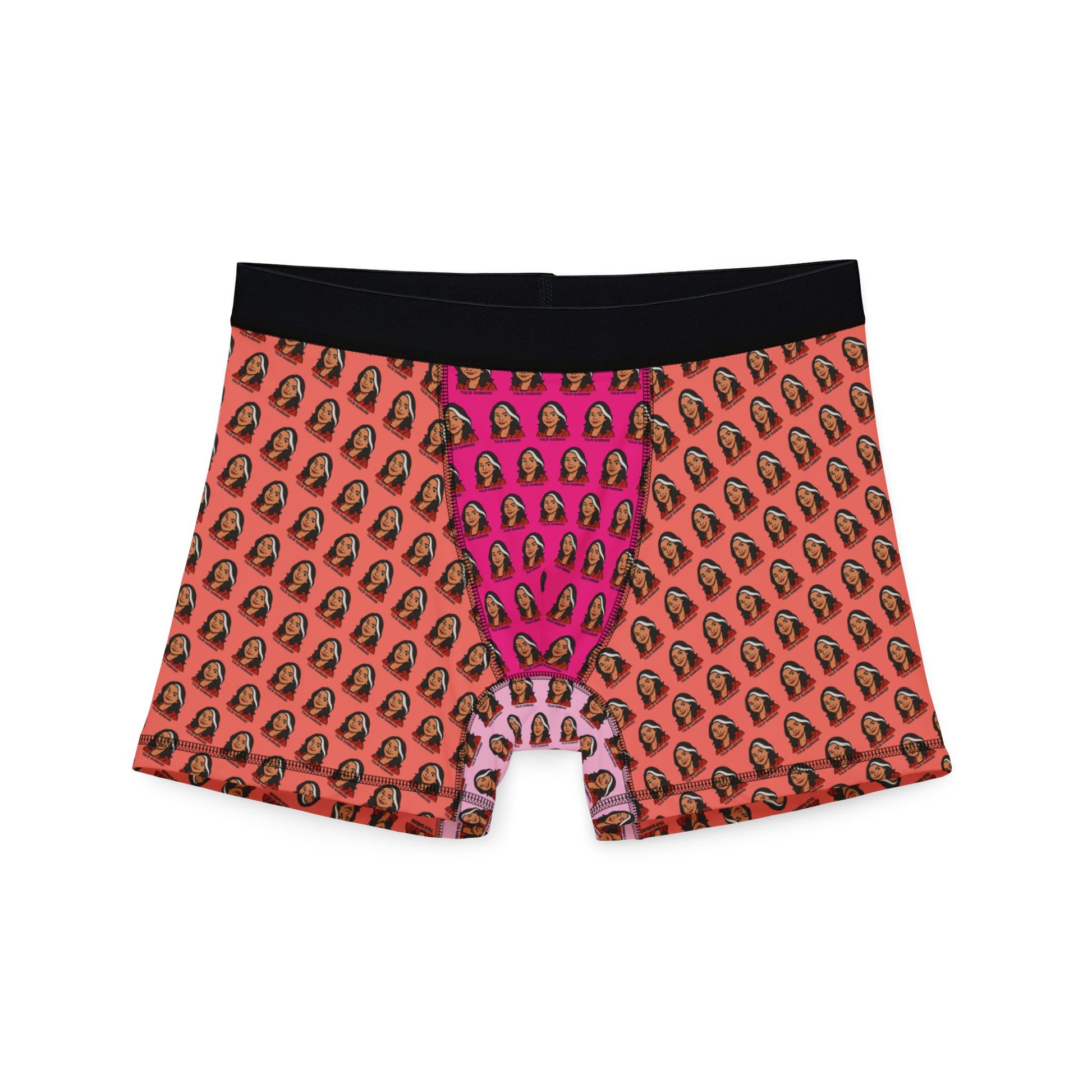 Flat lay of Tulsi Gabbard boxer briefs with face print on pink and orange gradient, black waistband