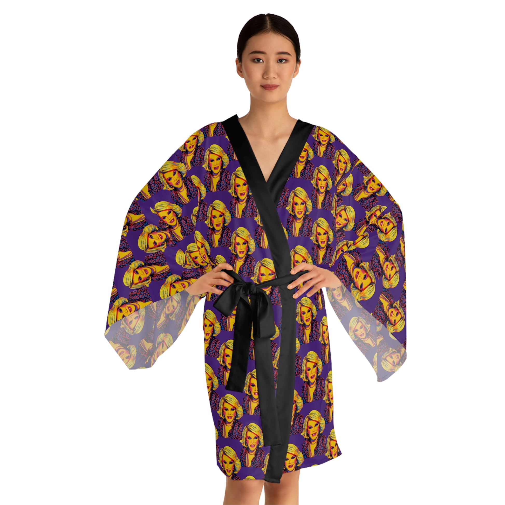Front view of woman wearing Joan Forever long sleeve kimono robe tied at the waist with black belt and graphic pop art print.