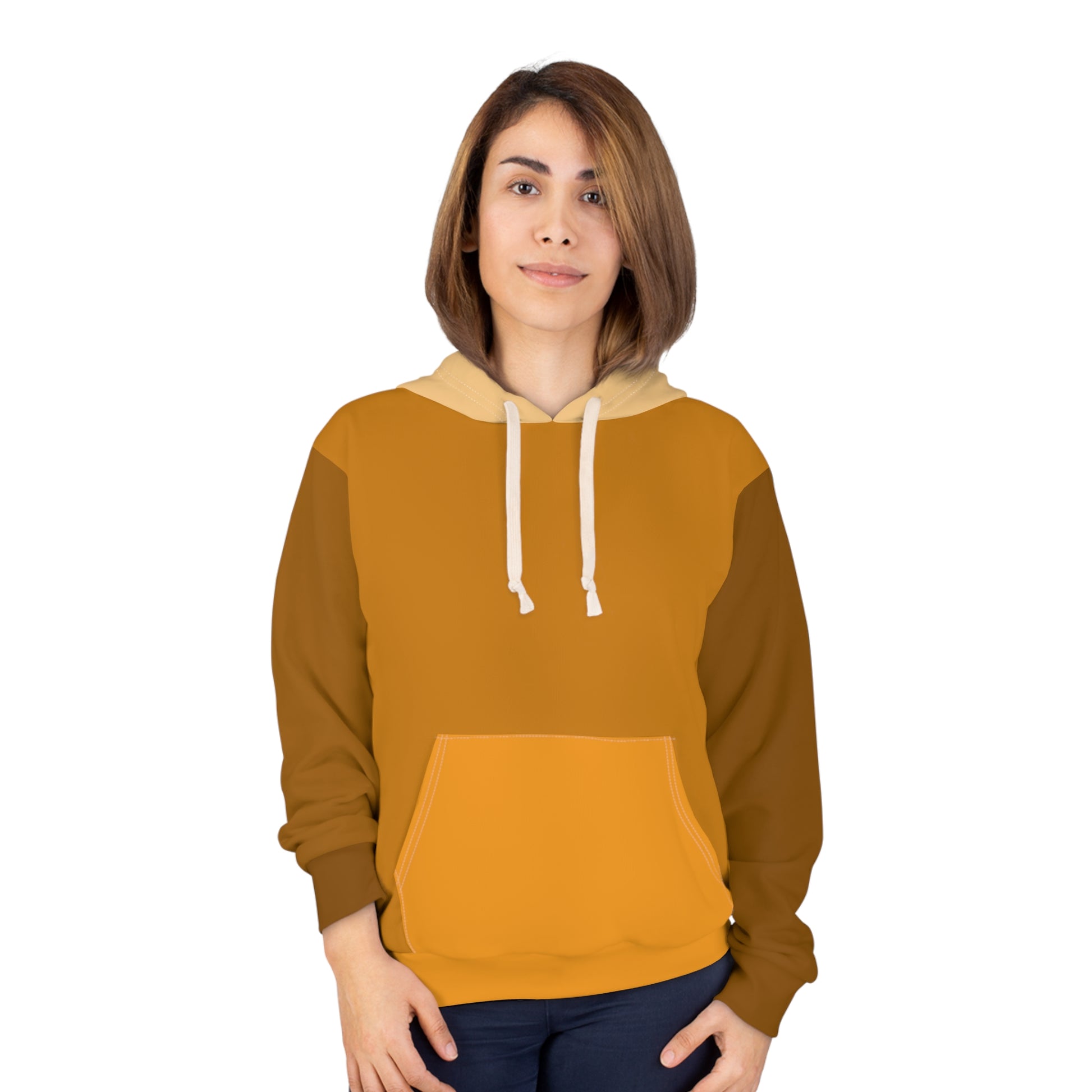 Female model wearing Cinnamon Unisex Hoodie displaying comfortable fit, stylish brown and tan tones, and casual streetwear style