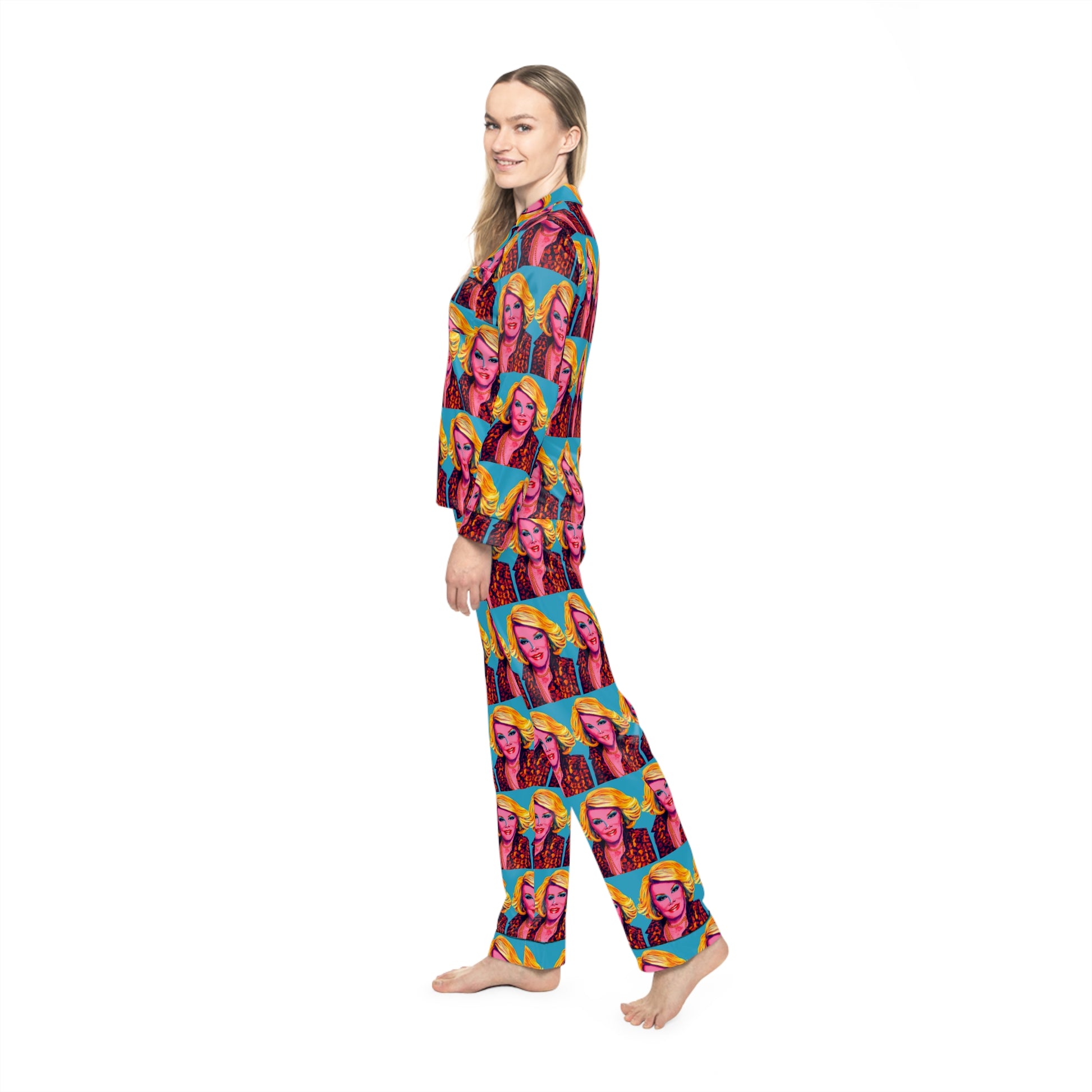 Side profile of woman wearing pop art satin pajama set highlighting smooth fabric drape and straight leg pants.
