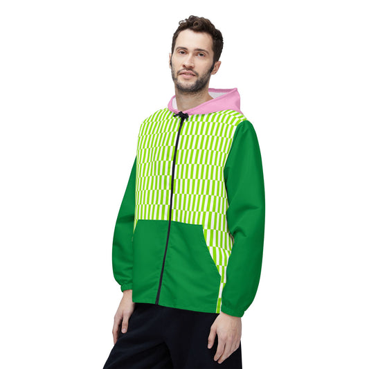 Man modeling Fresh Vibes Windbreaker front angle with green patterned front, dark green lower panel, and pink hood.