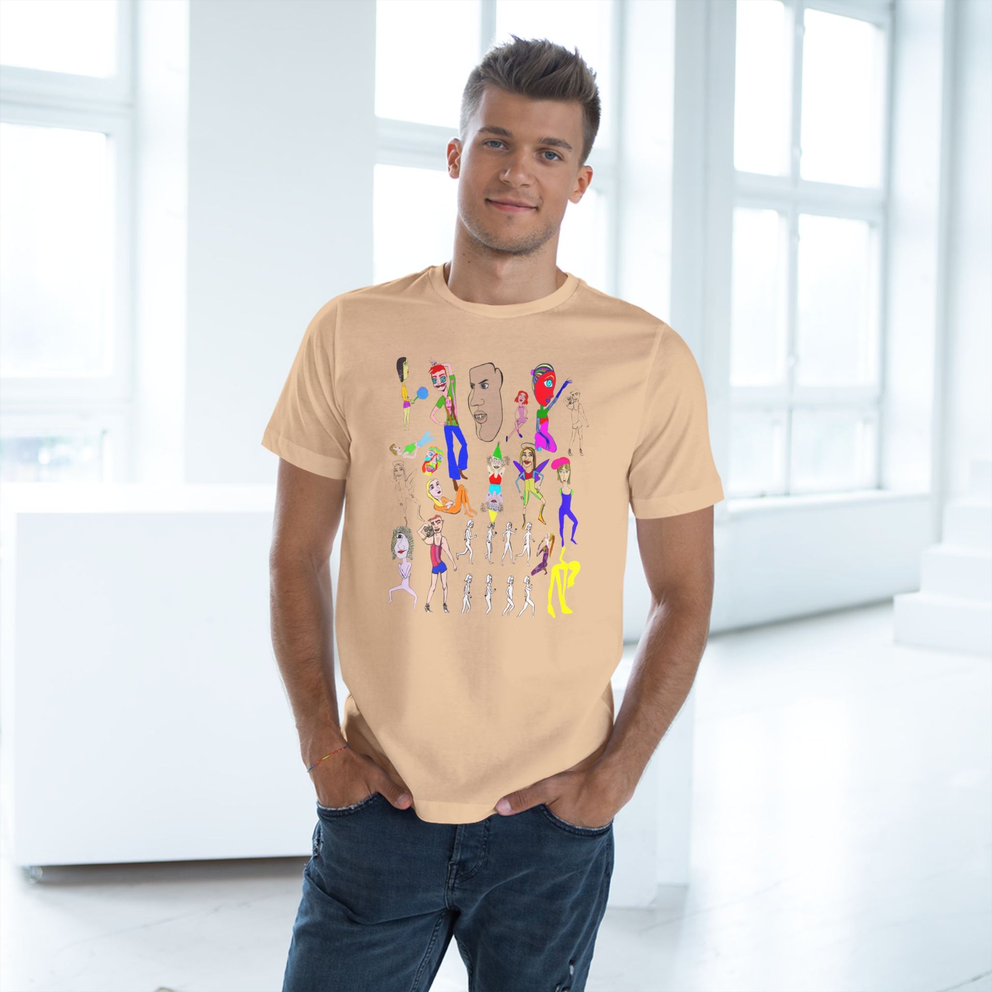 Male model wearing peach Mix Unisex Deluxe T-Shirt with hand drawn artwork, casual pose.