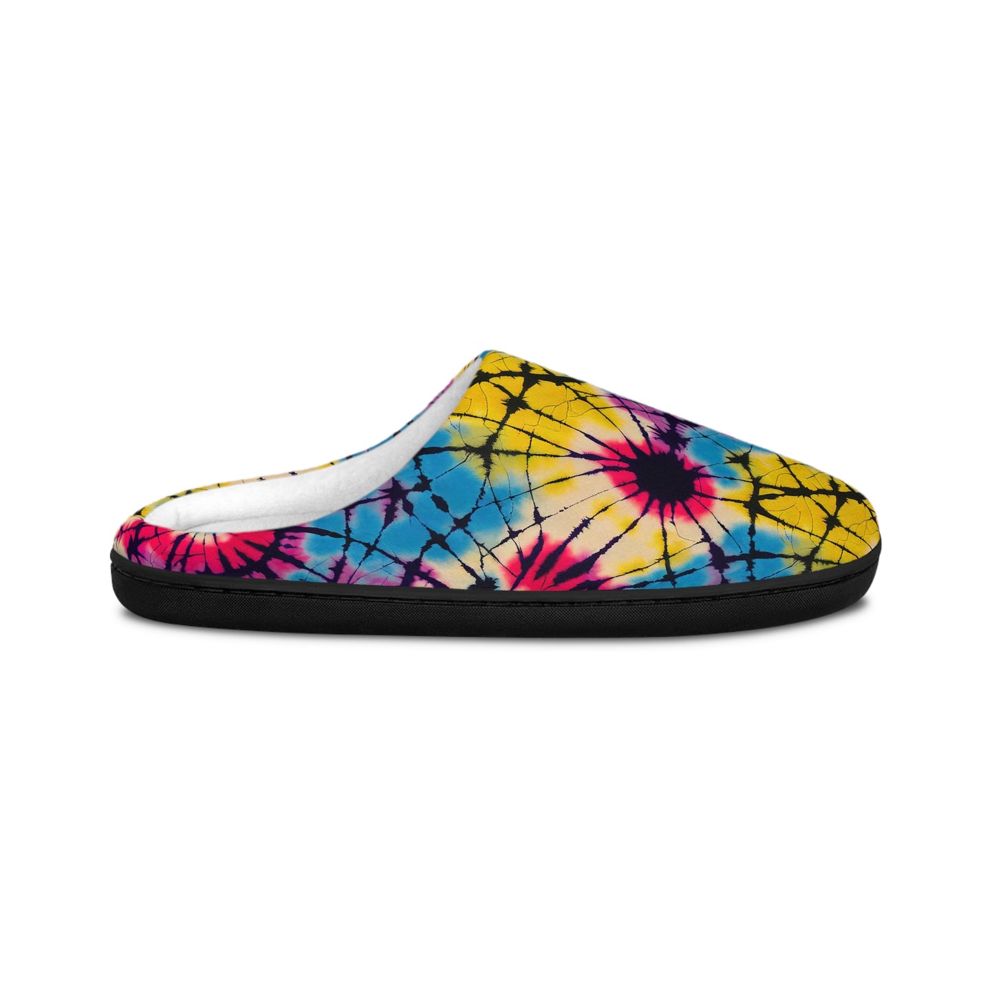 Side profile of a Men’s Tie-Dye Cozy Slipper highlighting the plush white interior, black sole, and vibrant tie-dye print.
