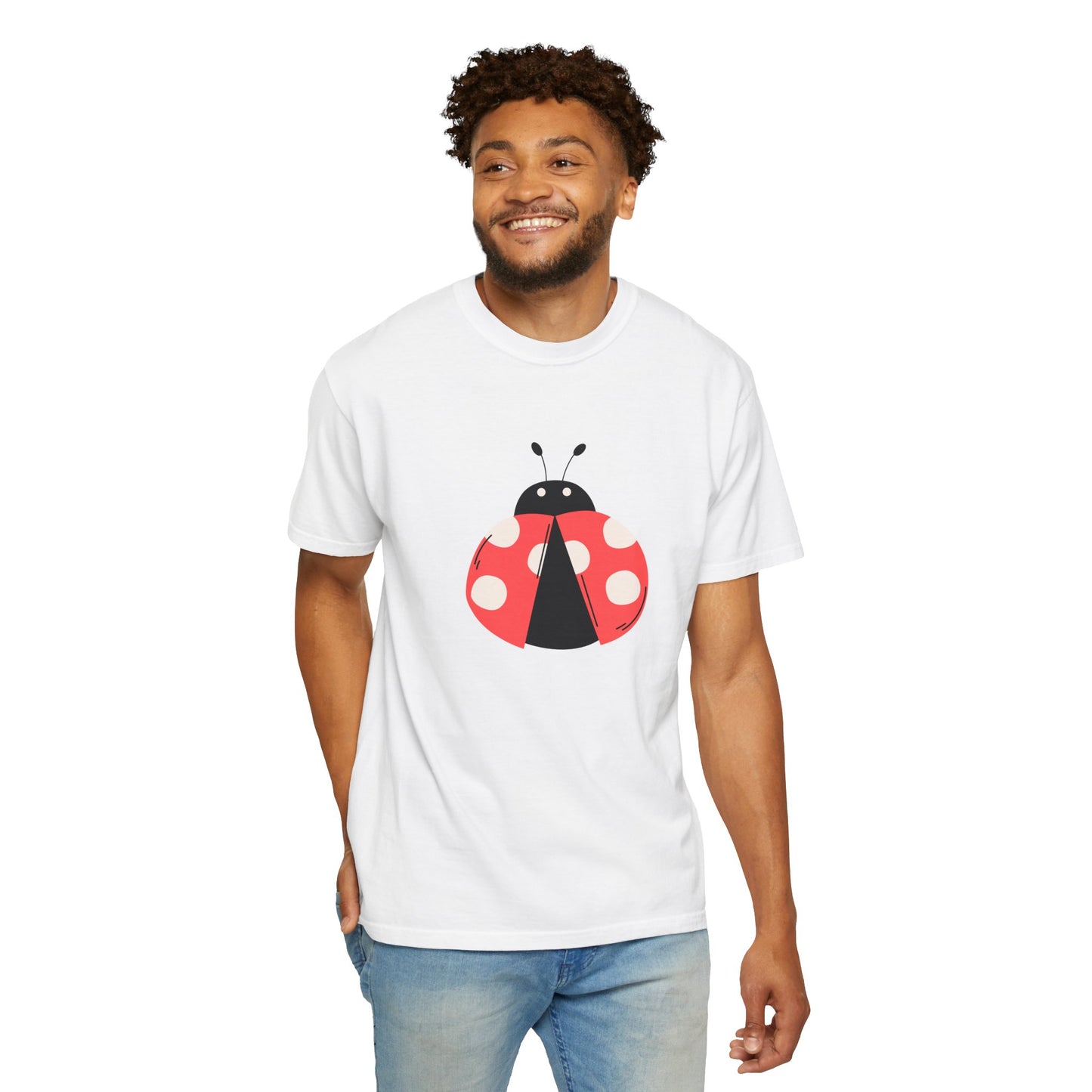 White Lady Bug T-Shirt worn by man with hands in pockets.