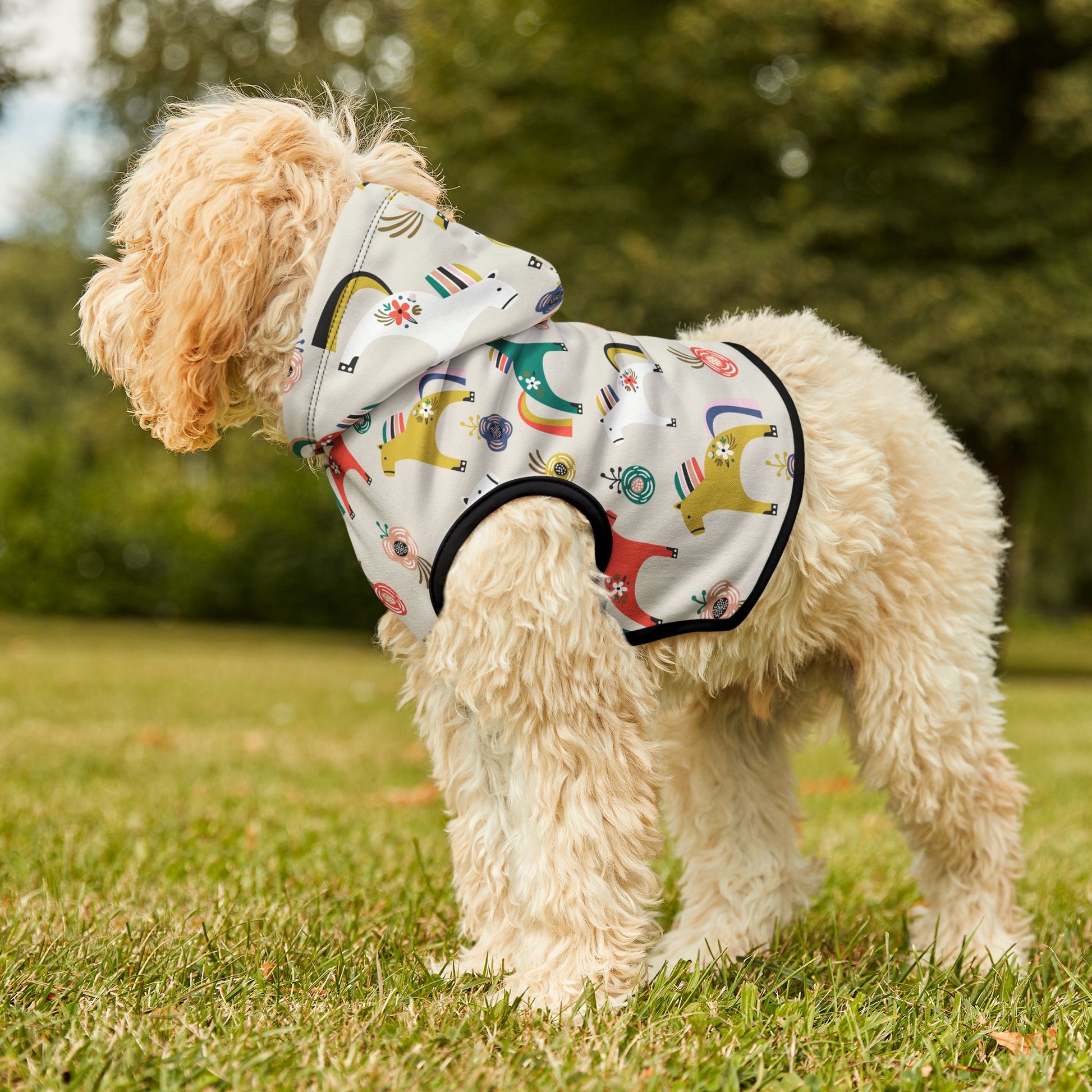 Dog standing outdoors in Horses Pet Hoodie with hood up