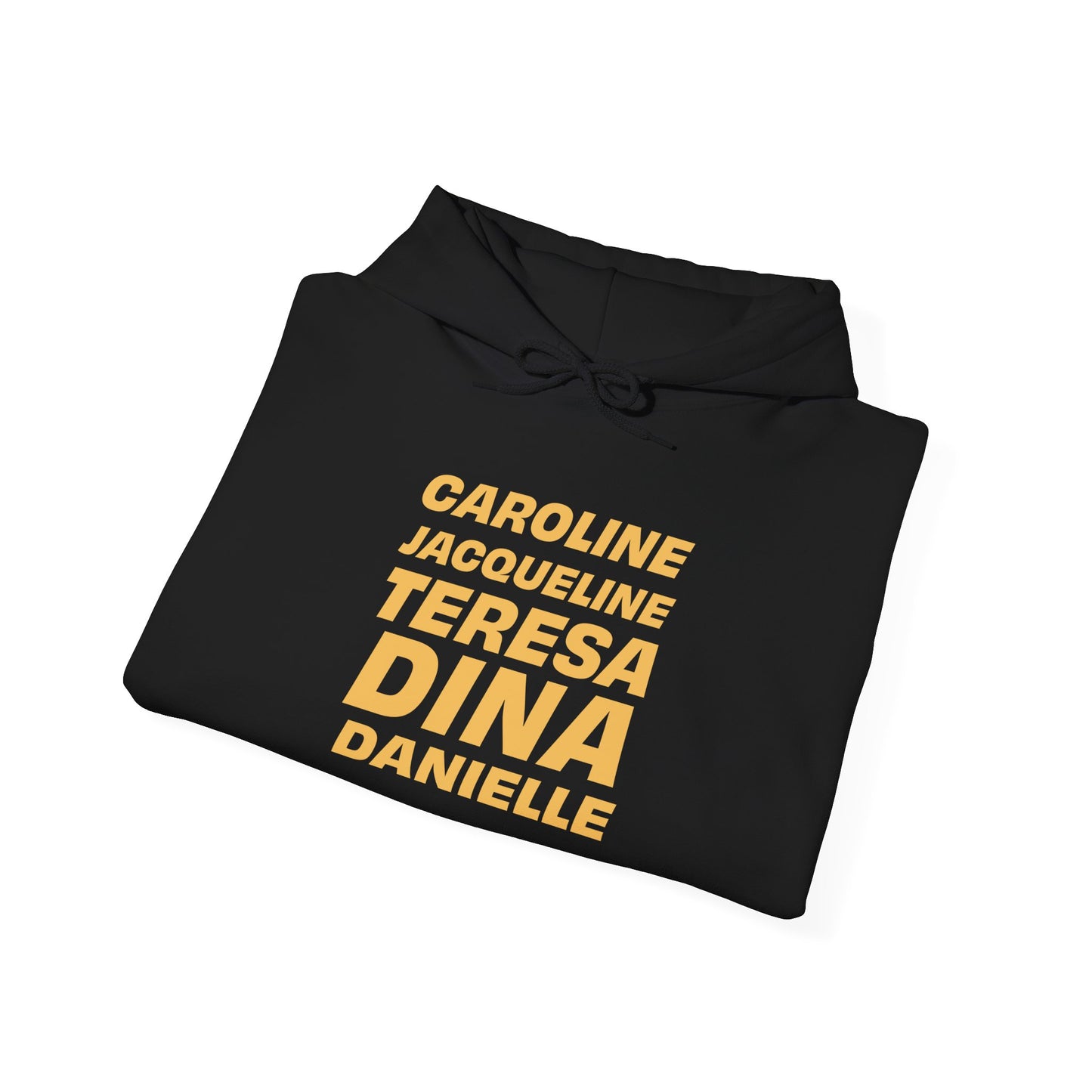Folded black OG NJ Housewives Hooded Sweatshirt featuring bold yellow text with names Caroline, Jacqueline, Teresa, Dina, and Danielle on the front.
