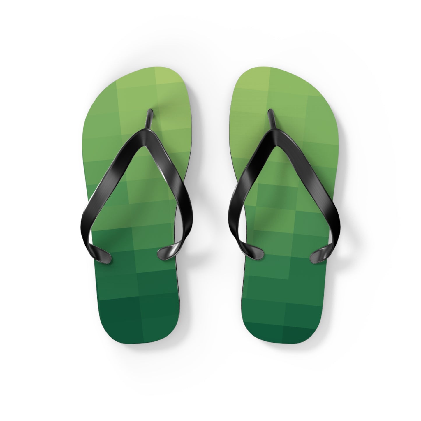 Minimal product shot of green 8-bit flip flops with black straps isolated on white background
