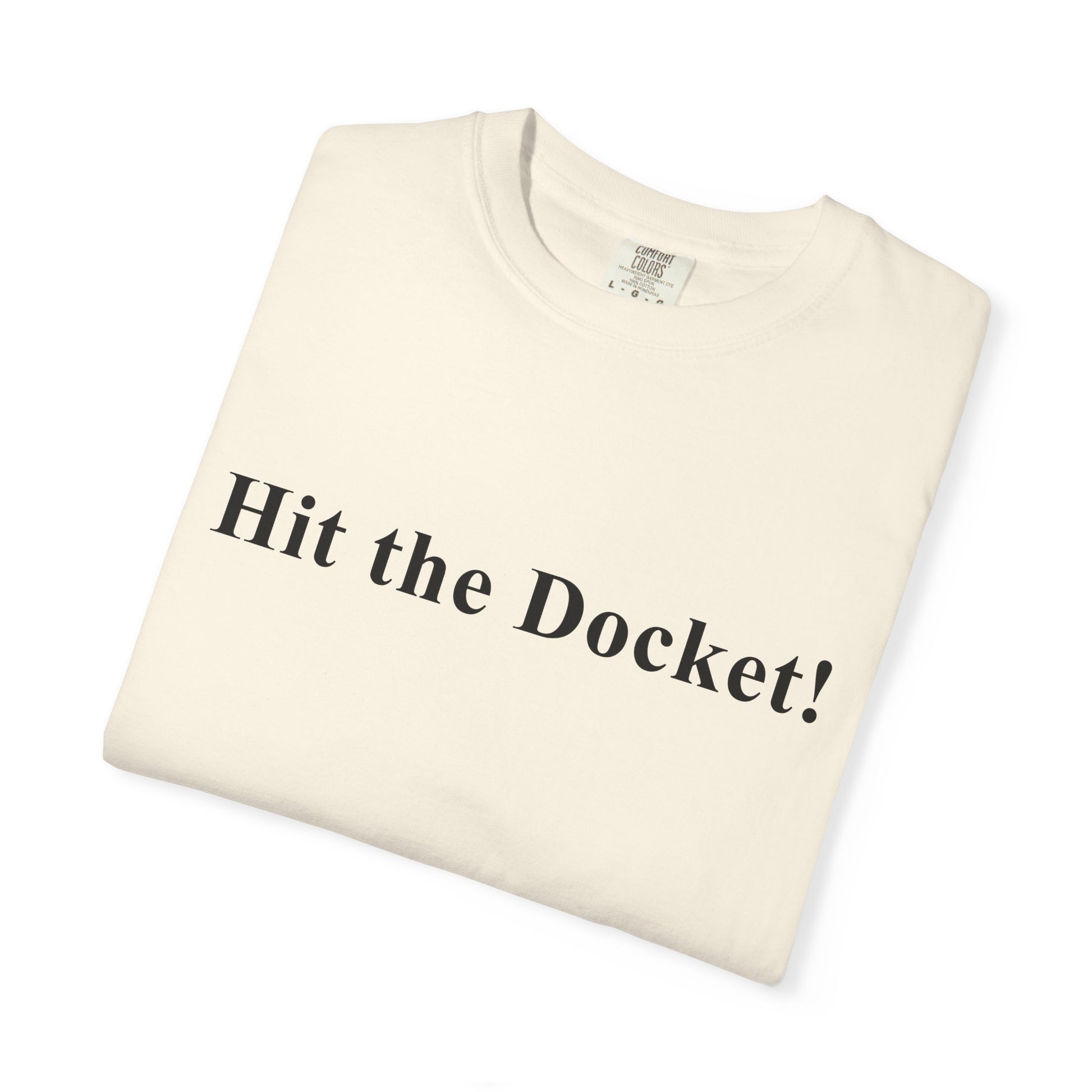 Folded t-shirt with 'Hit the Docket!' text on a white background