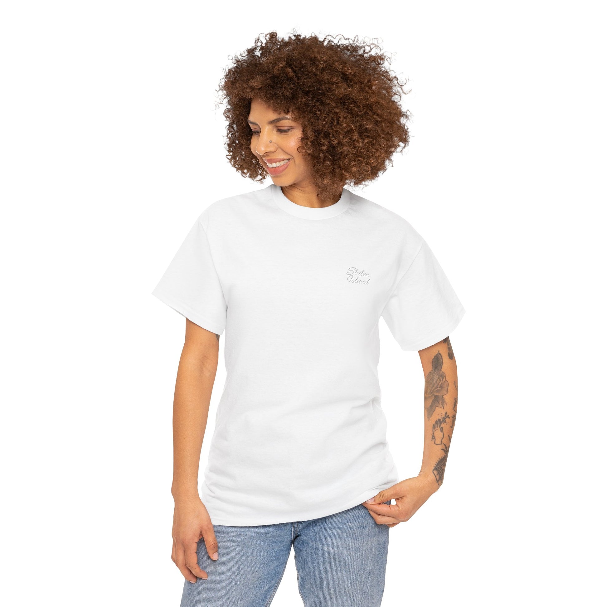 Female model with curly hair wearing white Staten Island T-Shirt.