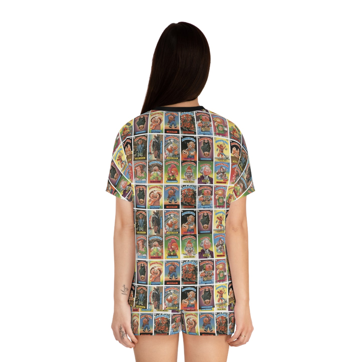 Person wearing a t-shirt with a colorful graphic design on a white background