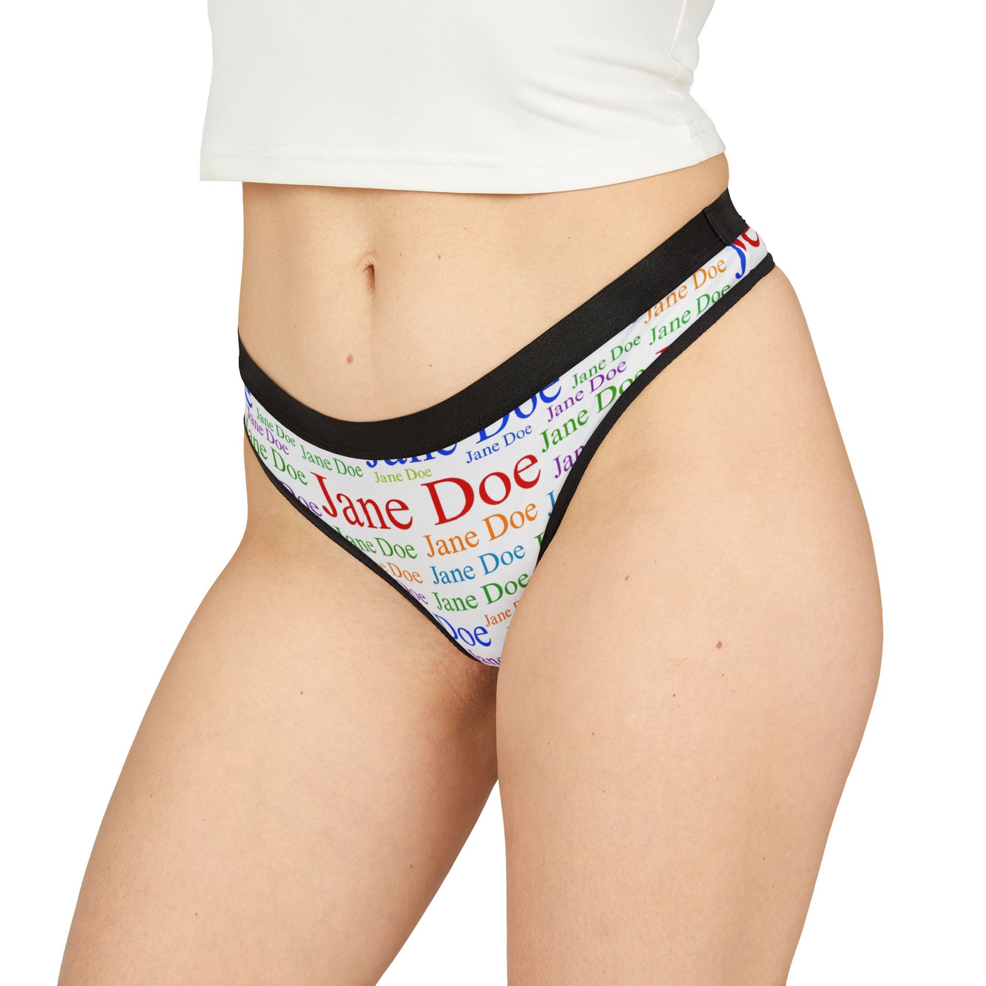 Model wearing Jane Doe Women’s Thongs – White Edition, side view