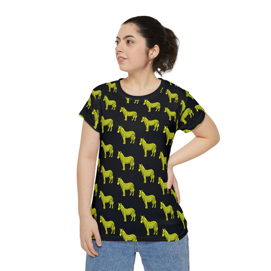 Woman wearing Yellow Zebra Women's T-Shirt with neon zebra print, styled with denim jeans, front full-body view.
