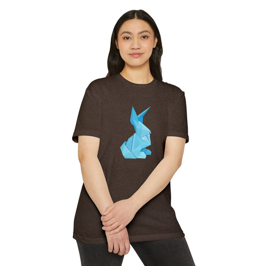 Woman wearing brown Origami Bunny T-Shirt with blue origami bunny print, standing with hands crossed.