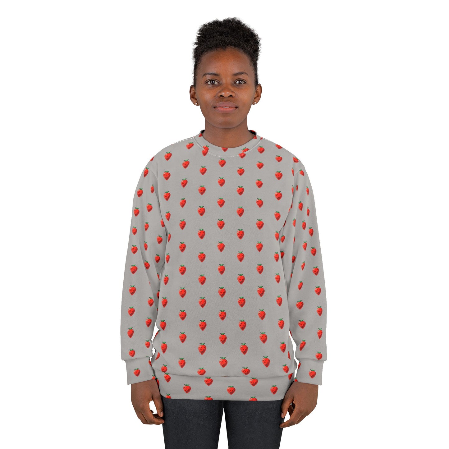 Young model wearing 8-bit Strawberry Sweatshirt with pixel strawberry print