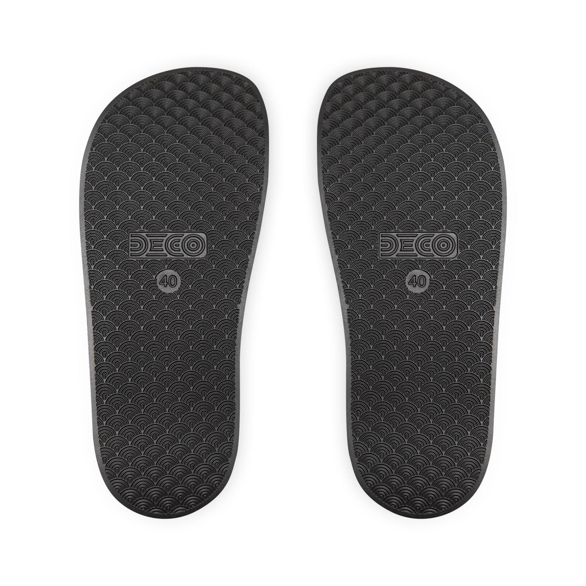 Bottom view of Watermelon Green Slide Sandals showing textured black soles.