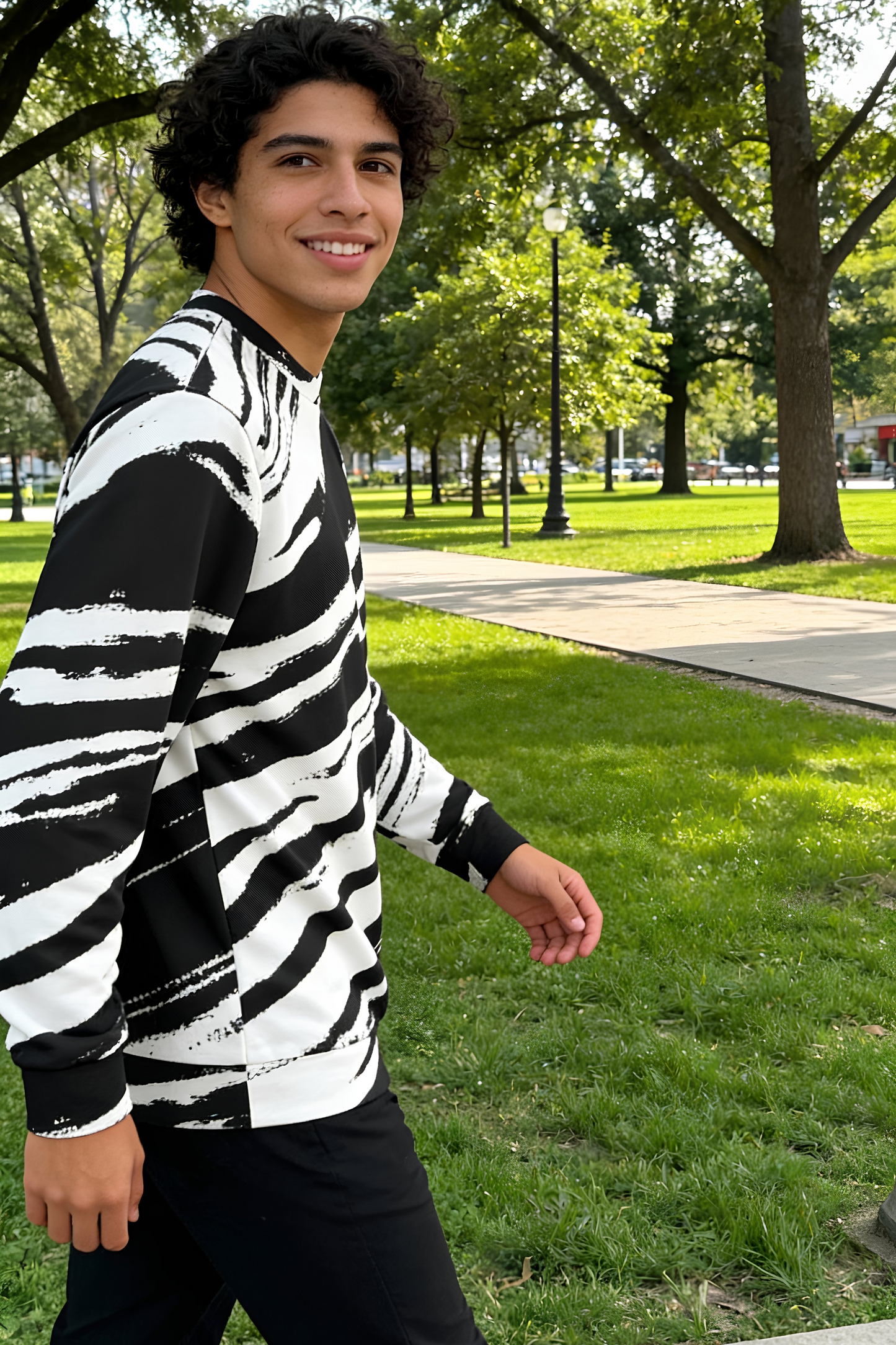 Black Strokes Unisex Sweatshirt worn by male model walking in park