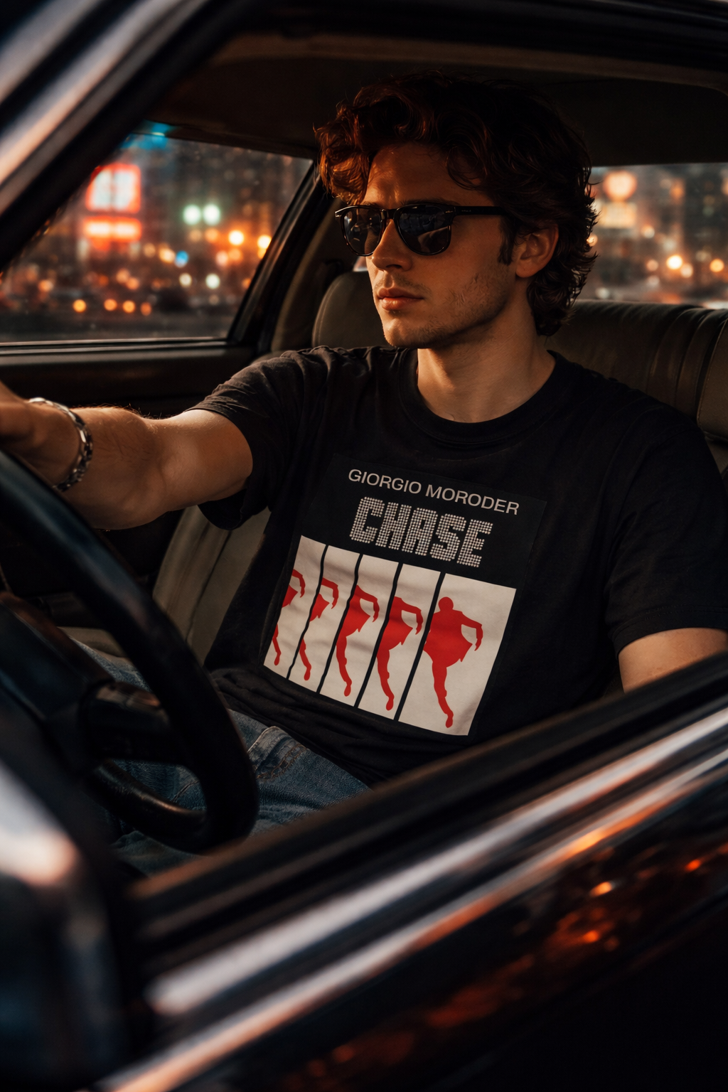 Giorgio Moroder CHASE t-shirt black synthwave graphic tee worn by man driving at night cinematic lighting
