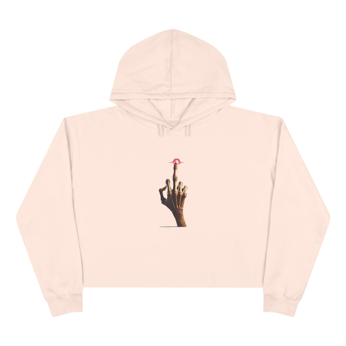 A cream colored crop hoodie with a minimalist E.T.-inspired graphic of a hand with an extended glowing finger touching a small red spaceship.