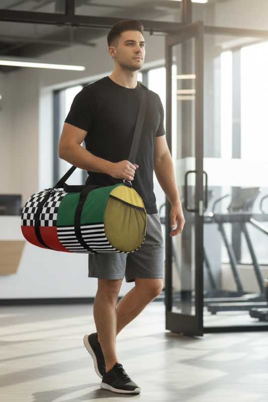 Man holding a Gridlock duffel bag in an indoor setting