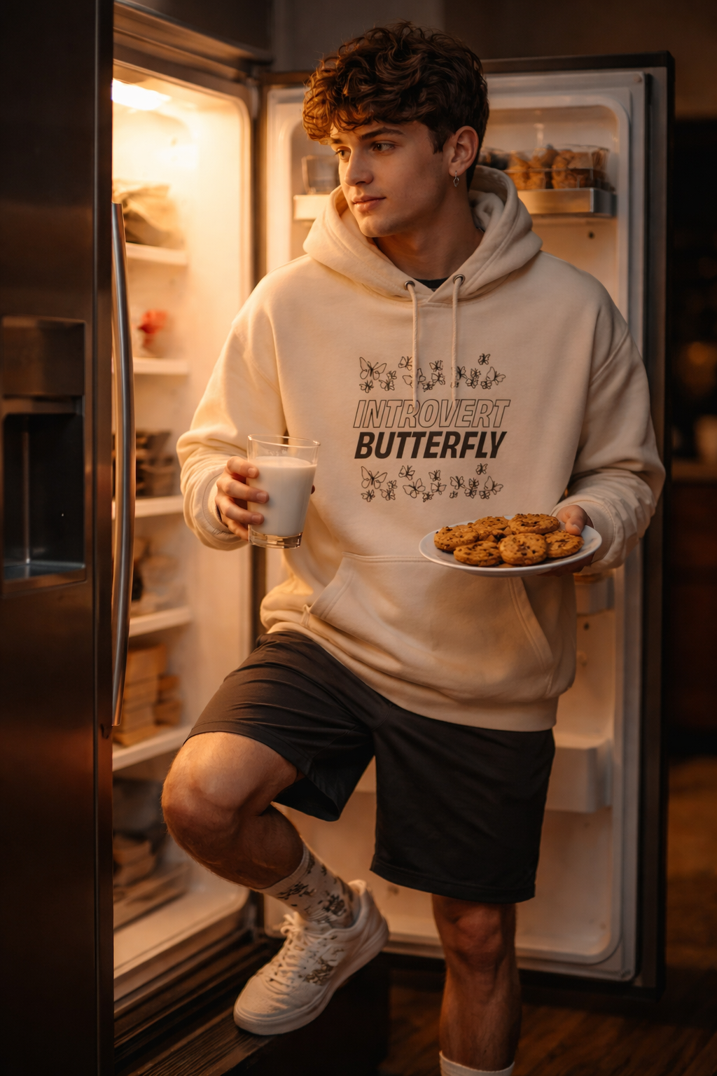 man wearing white introvert hoodie casual indoor lifestyle