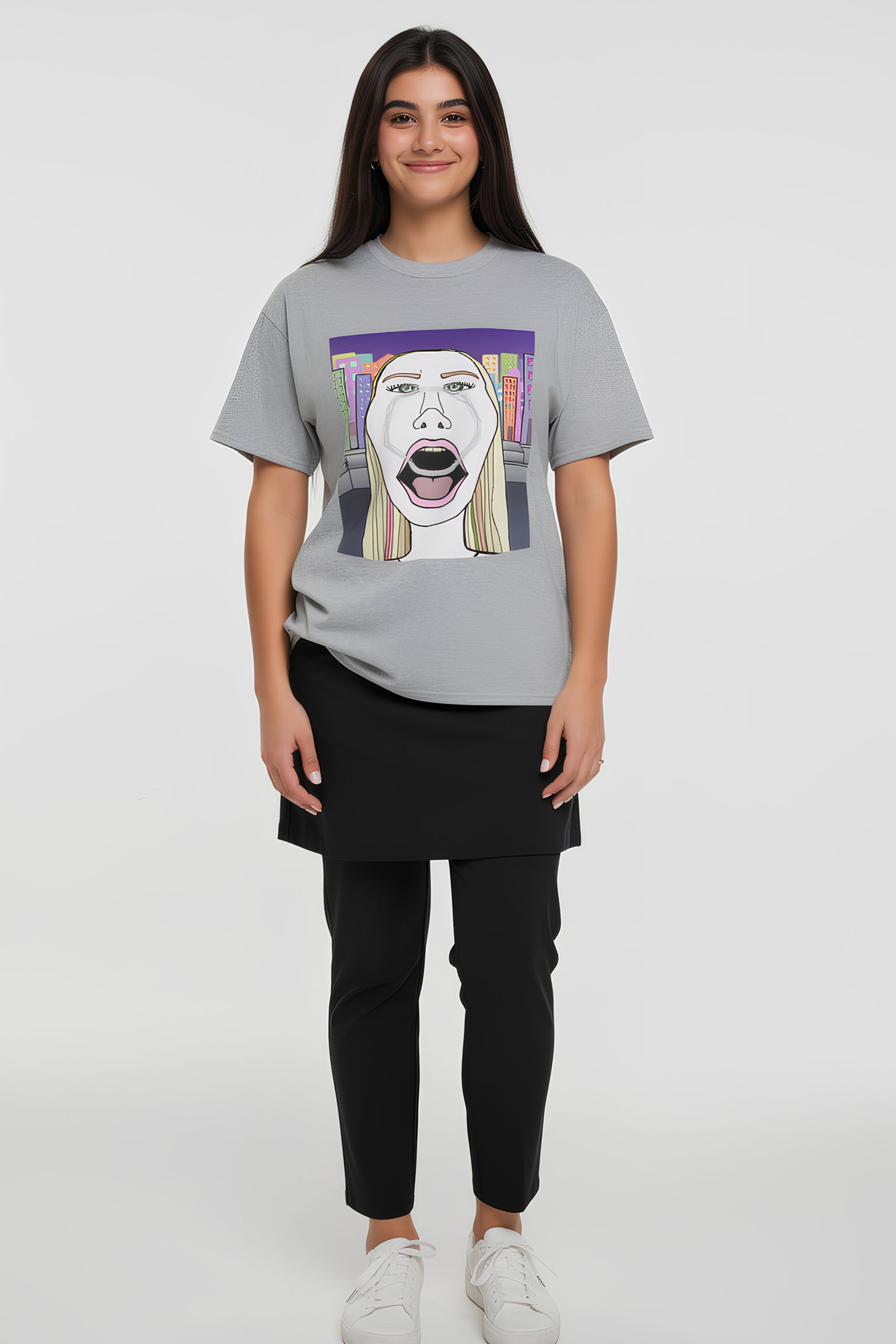 Model wearing gray graphic T shirt with pop art face design, full body lifestyle view