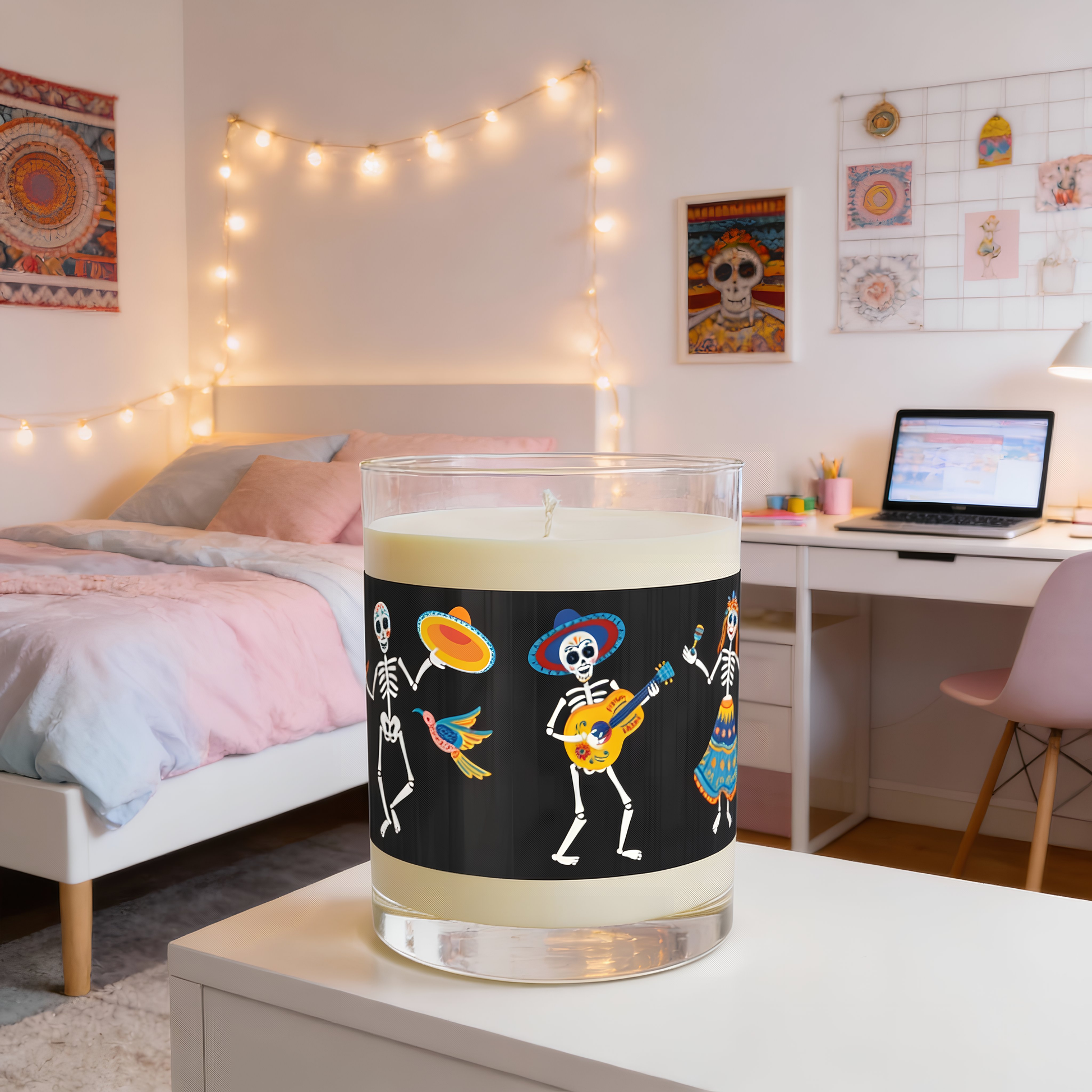 Dancing Skeletons Sage Lavender Candle glowing on nightstand in cozy room