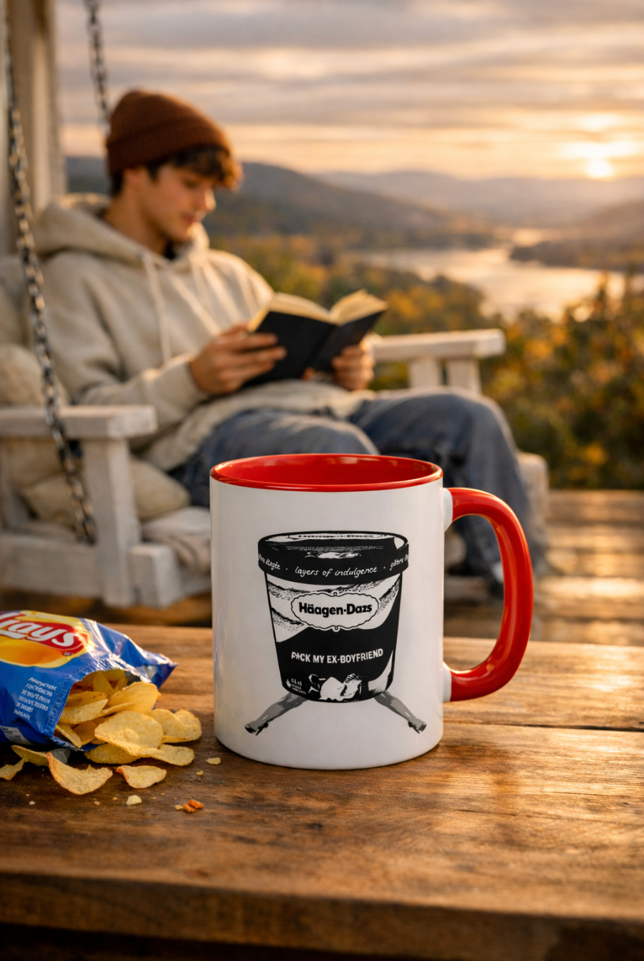 Ex-Boyfriend Coffee Mug on wooden table with person reading outdoors at sunset