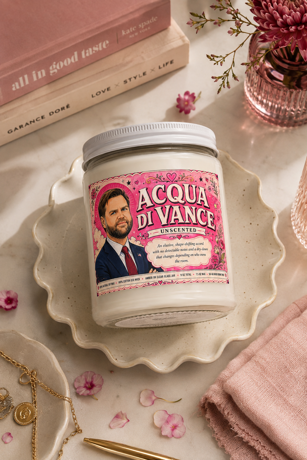 Acqua di Vance unscented JD Vance candle styled in a pink editorial flat lay