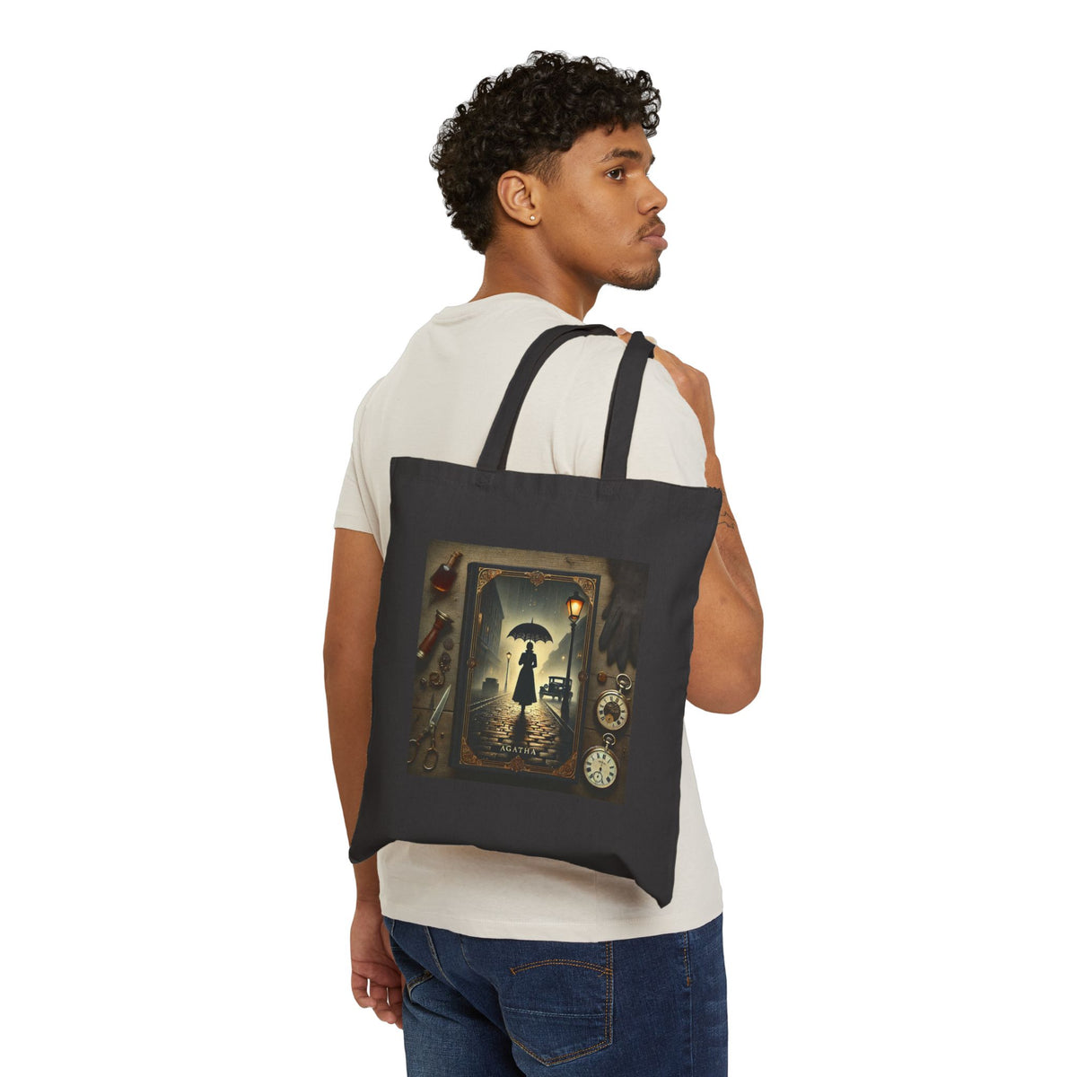 Male model carrying Agatha mystery book tote bag in black