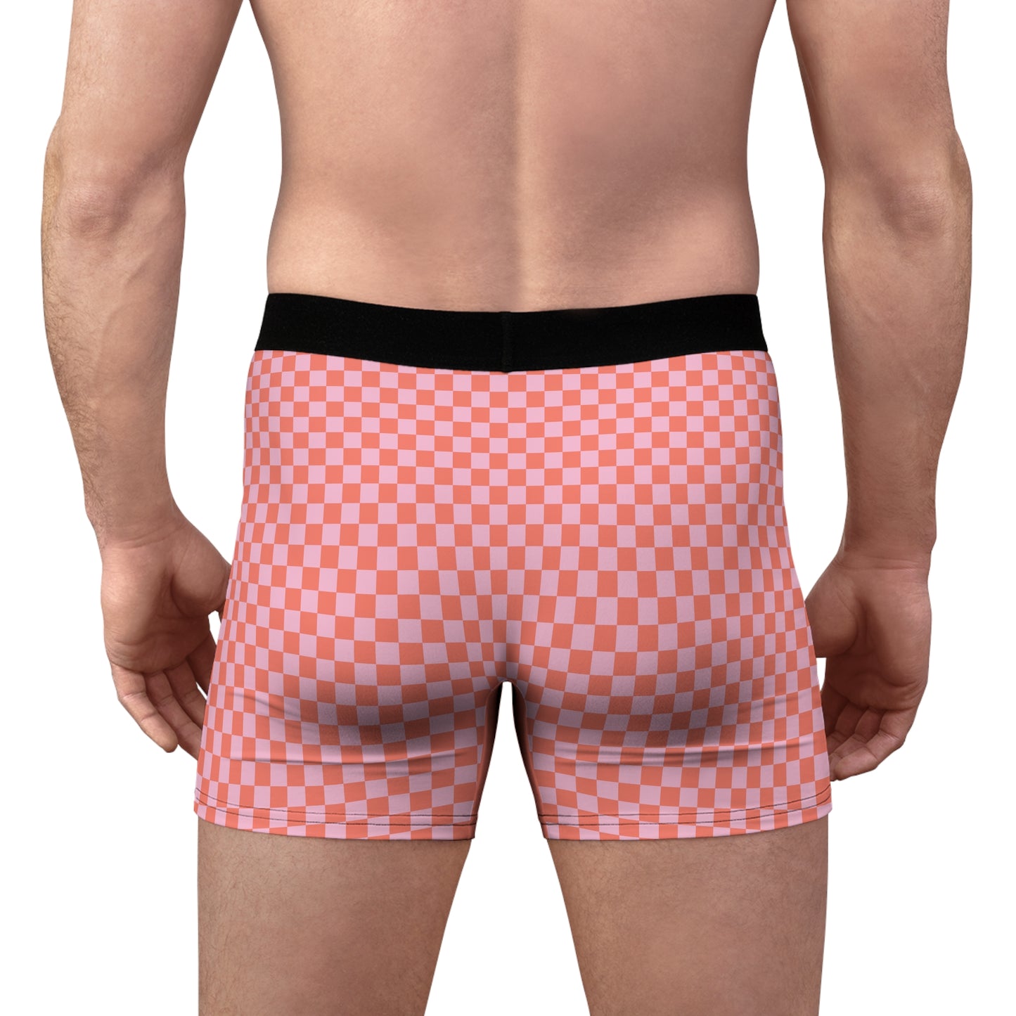 Back on-model view of Tantrum Media AOC boxer briefs featuring a pink checkered pattern and black elastic waistband.