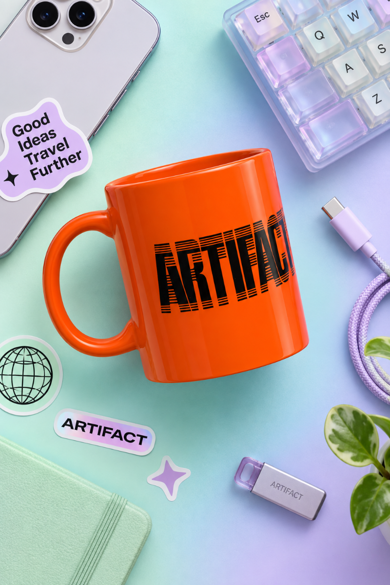 Orange Artifact Tech Mug flat lay with modern tech and college desk accessories