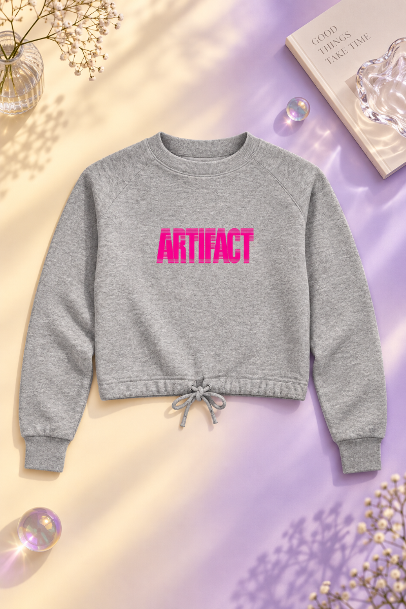 Gray Artifact Women’s Boxy Fleece Crewneck sweatshirt flat lay with hot pink typography