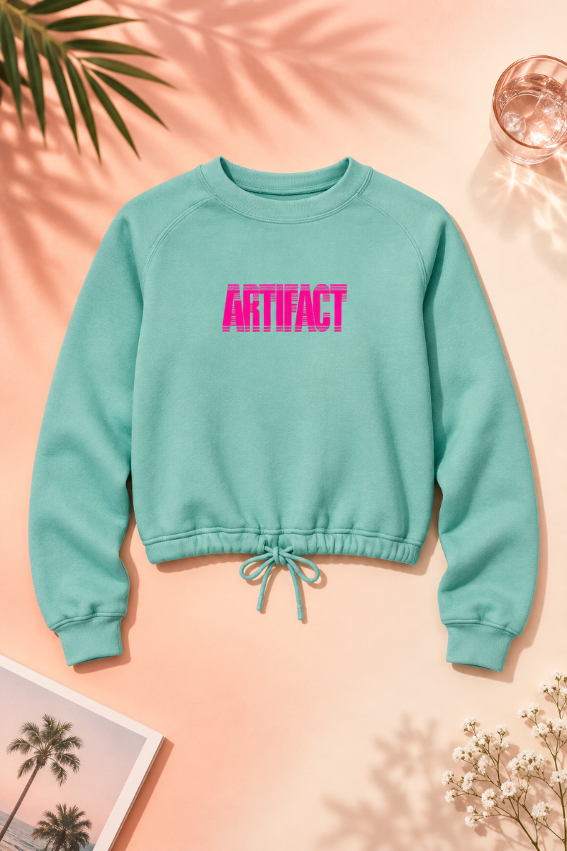 Saltwater Artifact Women’s Boxy Fleece Crewneck sweatshirt flat lay with hot pink graphic