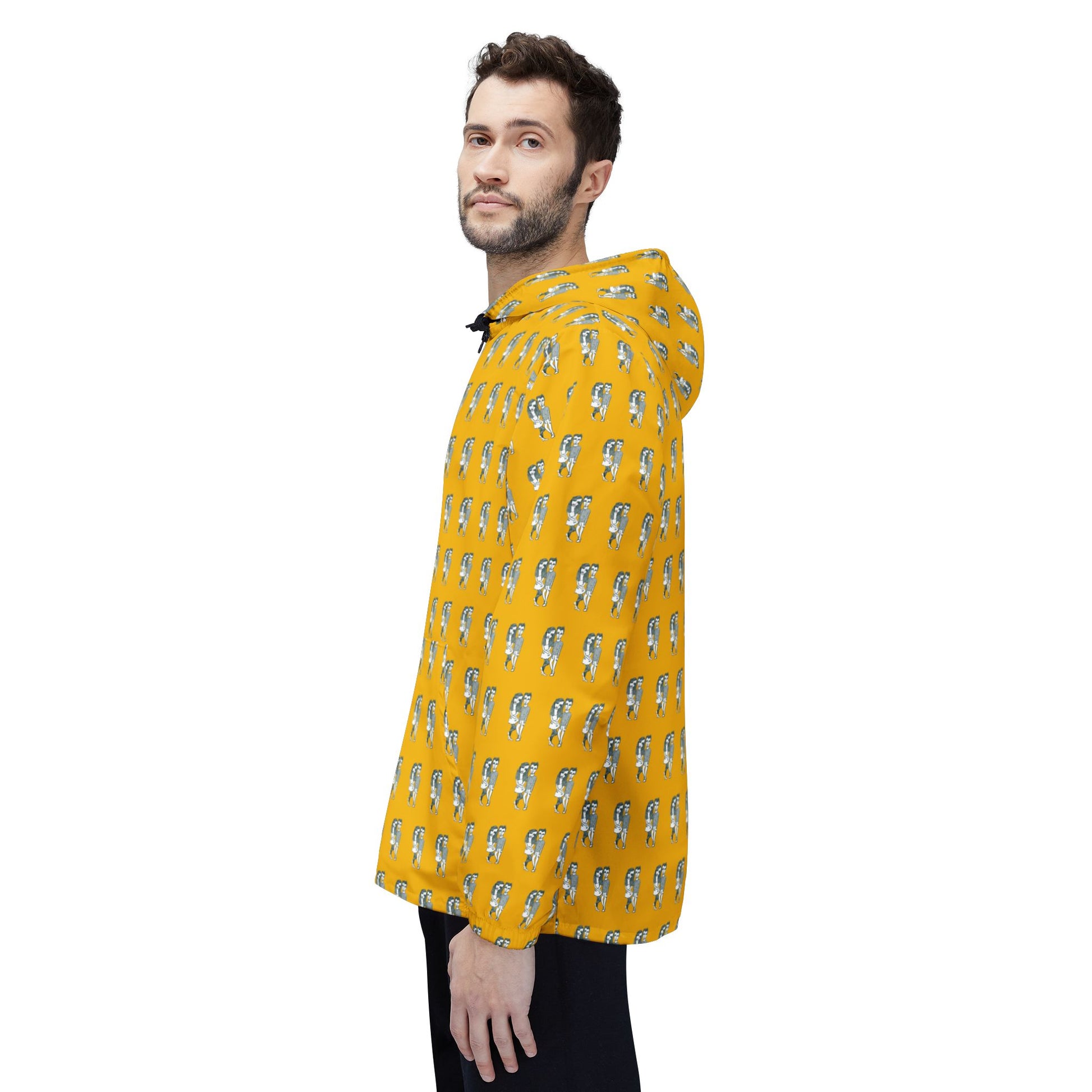 Side view of man wearing Babes yellow windbreaker jacket with original hand-drawn print