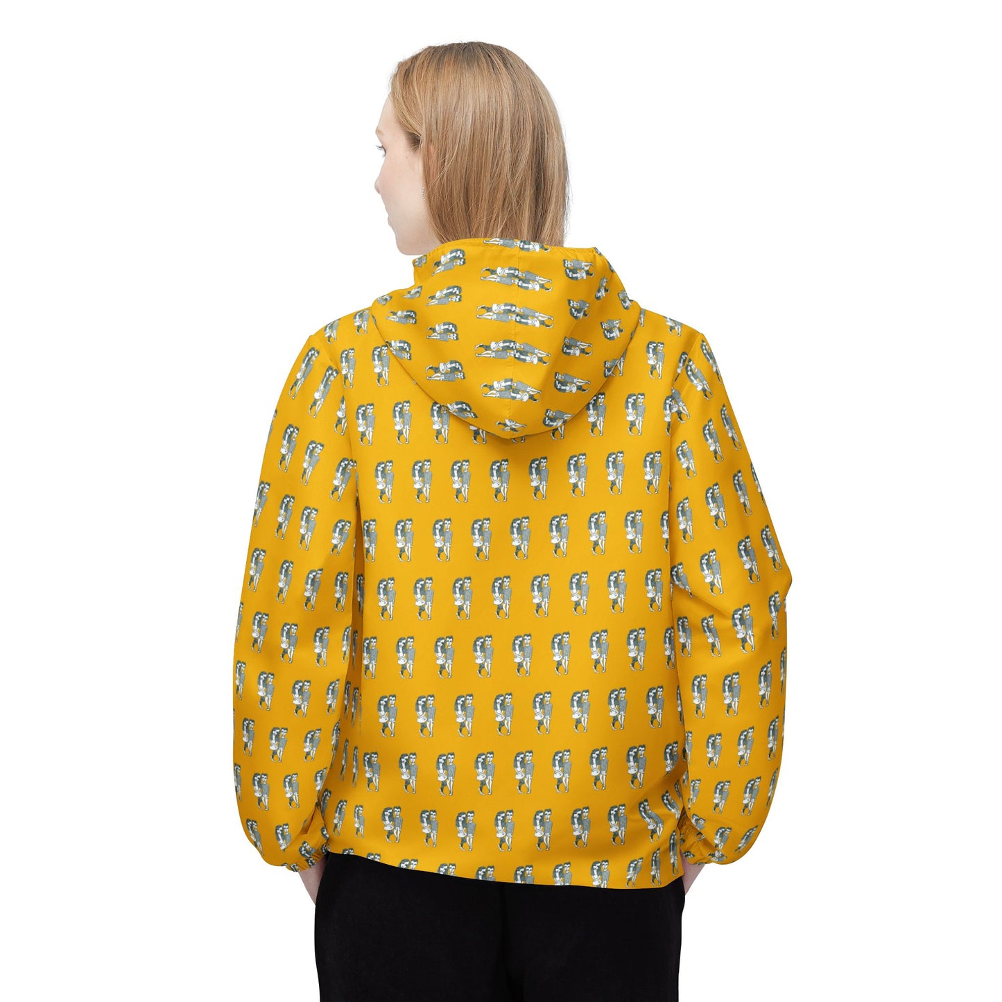 Back view of woman wearing Babes yellow windbreaker jacket with all-over illustrated pattern