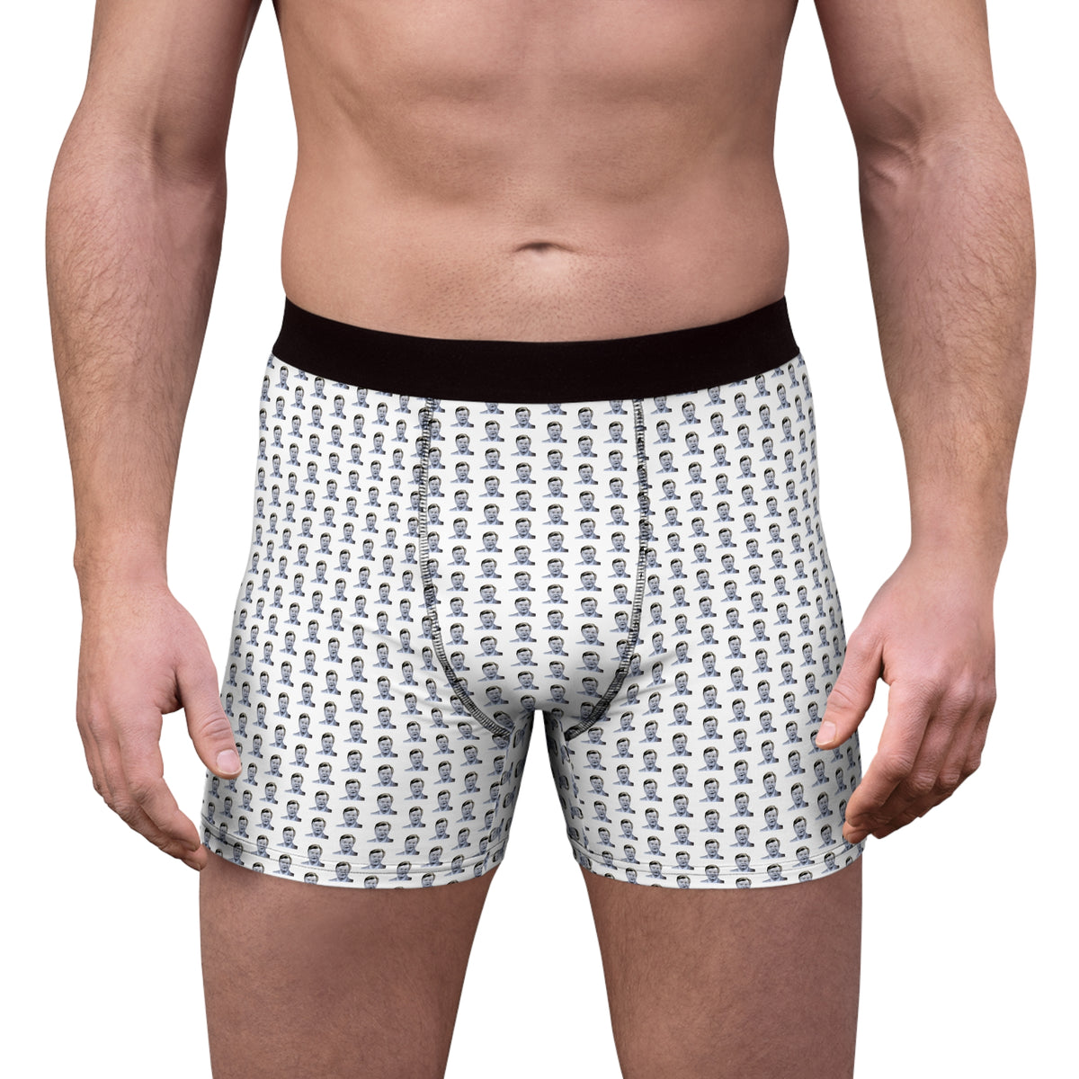 Male model wearing Benny Hill men’s boxer briefs with black waistband and repeating portrait print, front view