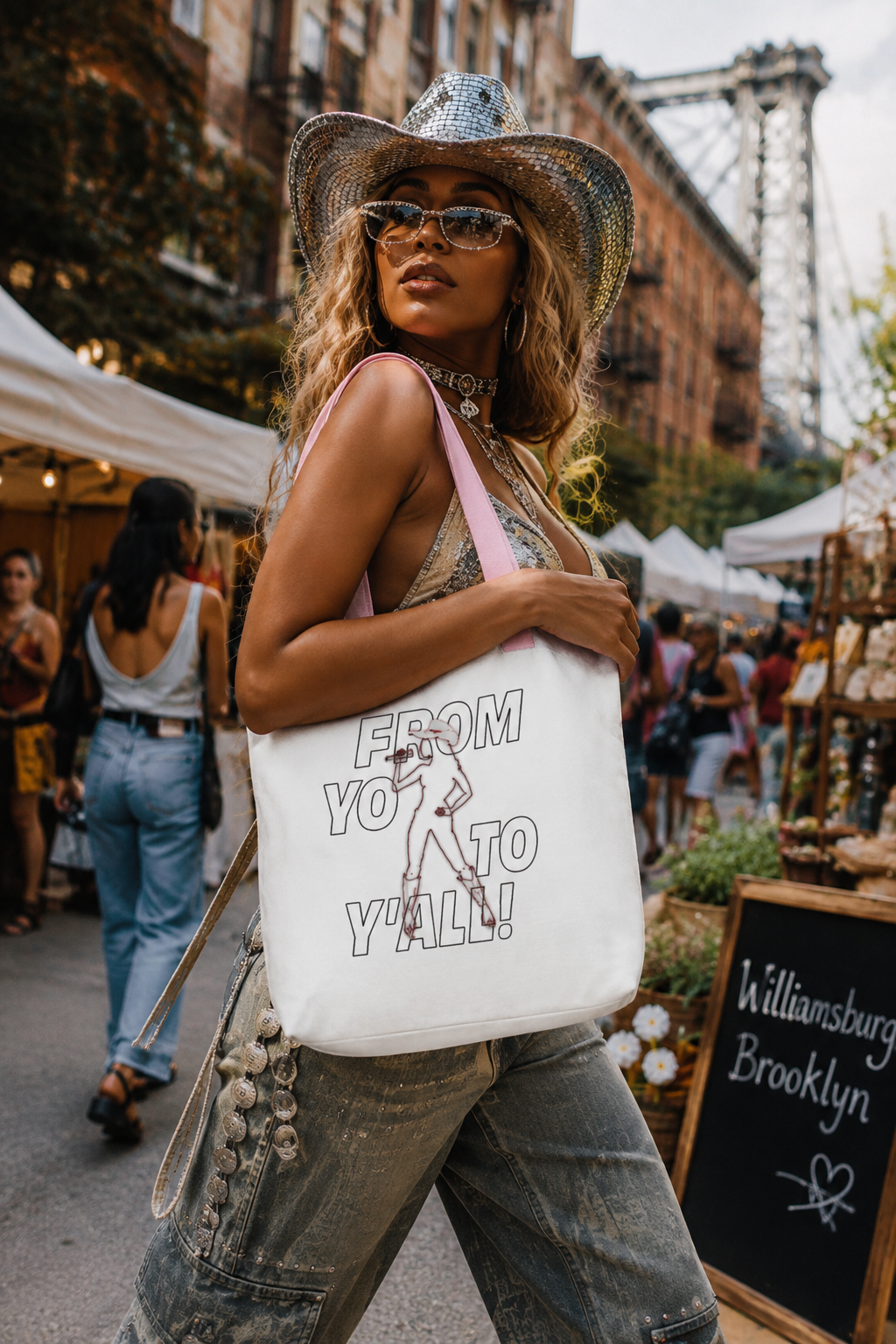 Woman carrying From Yo to Y’All Beyoncé country era inspired graphic tote bag outdoors