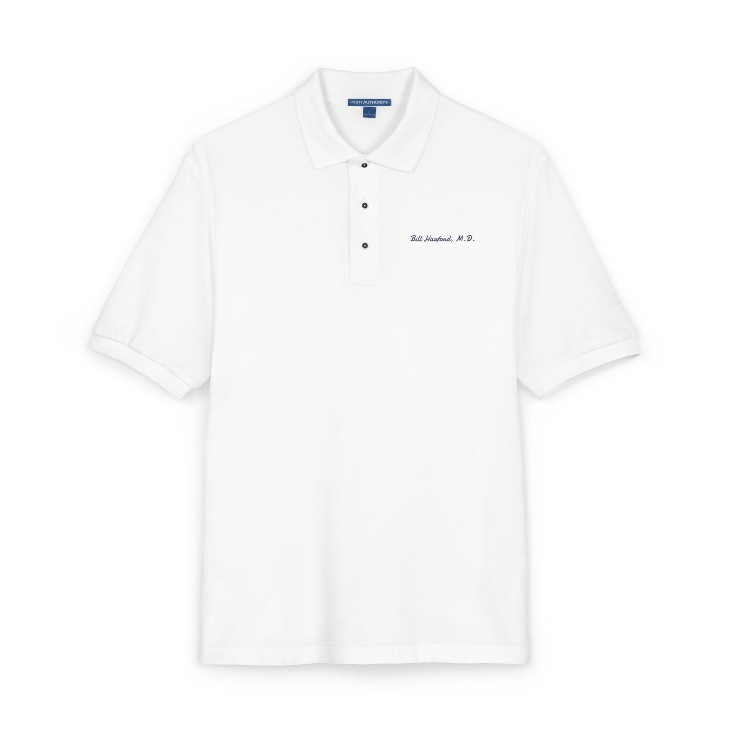 angled front view Bill Harford M.D embroidered polo shirt showing navy chest embroidery detail Eyes Wide Shut reference