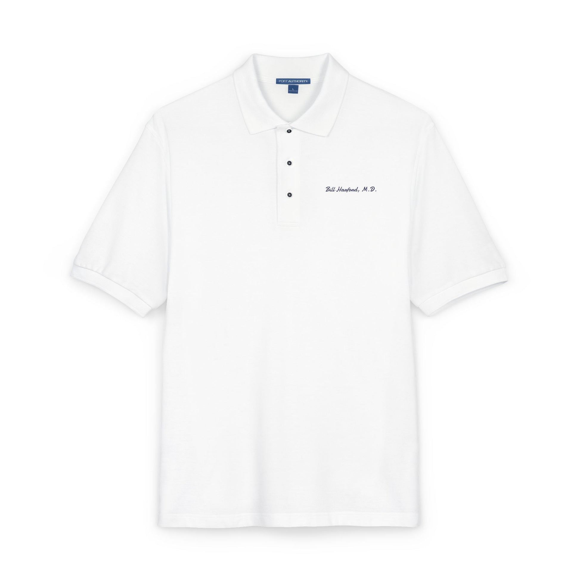 angled front view Bill Harford M.D embroidered polo shirt showing navy chest embroidery detail Eyes Wide Shut reference