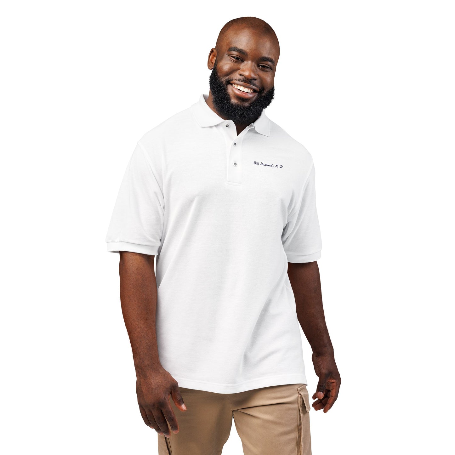 male model wearing white embroidered Bill Harford M.D polo shirt Eyes Wide Shut inspired unisex fit front view